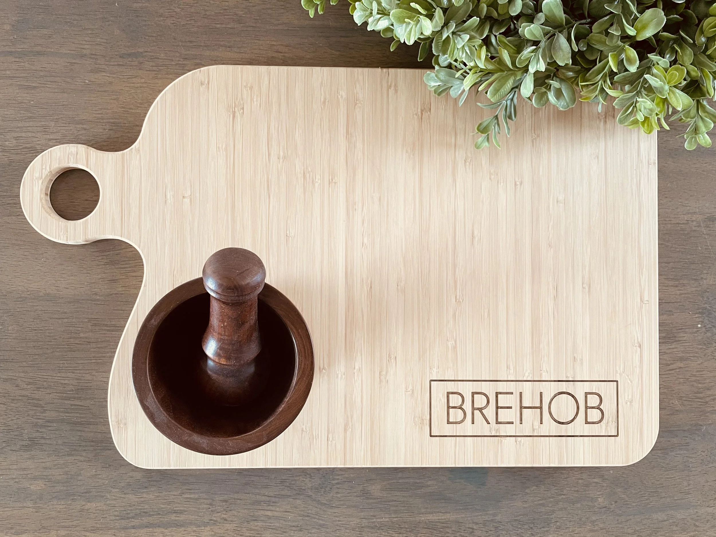 Cutting boards I custom designed and fabricated using hand tools & router. Finished by laser engraving the names on the board. 