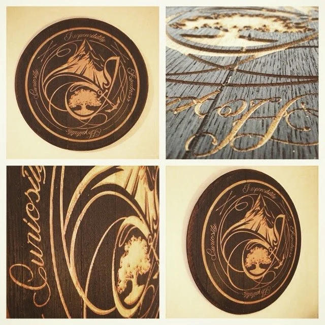 Family Crest designed and laser engraved on a bourbon barrel lid, then stained. Have a lot of these sort of projects come in and this was one of my faves. 