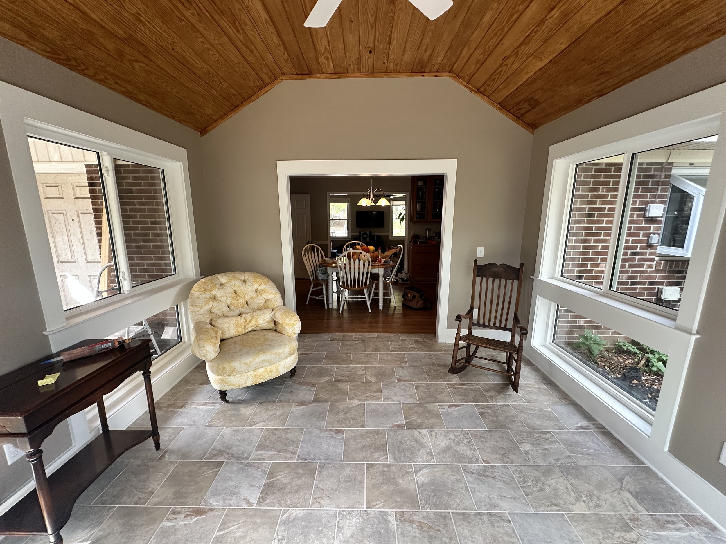 Sunroom addition inside view facing house