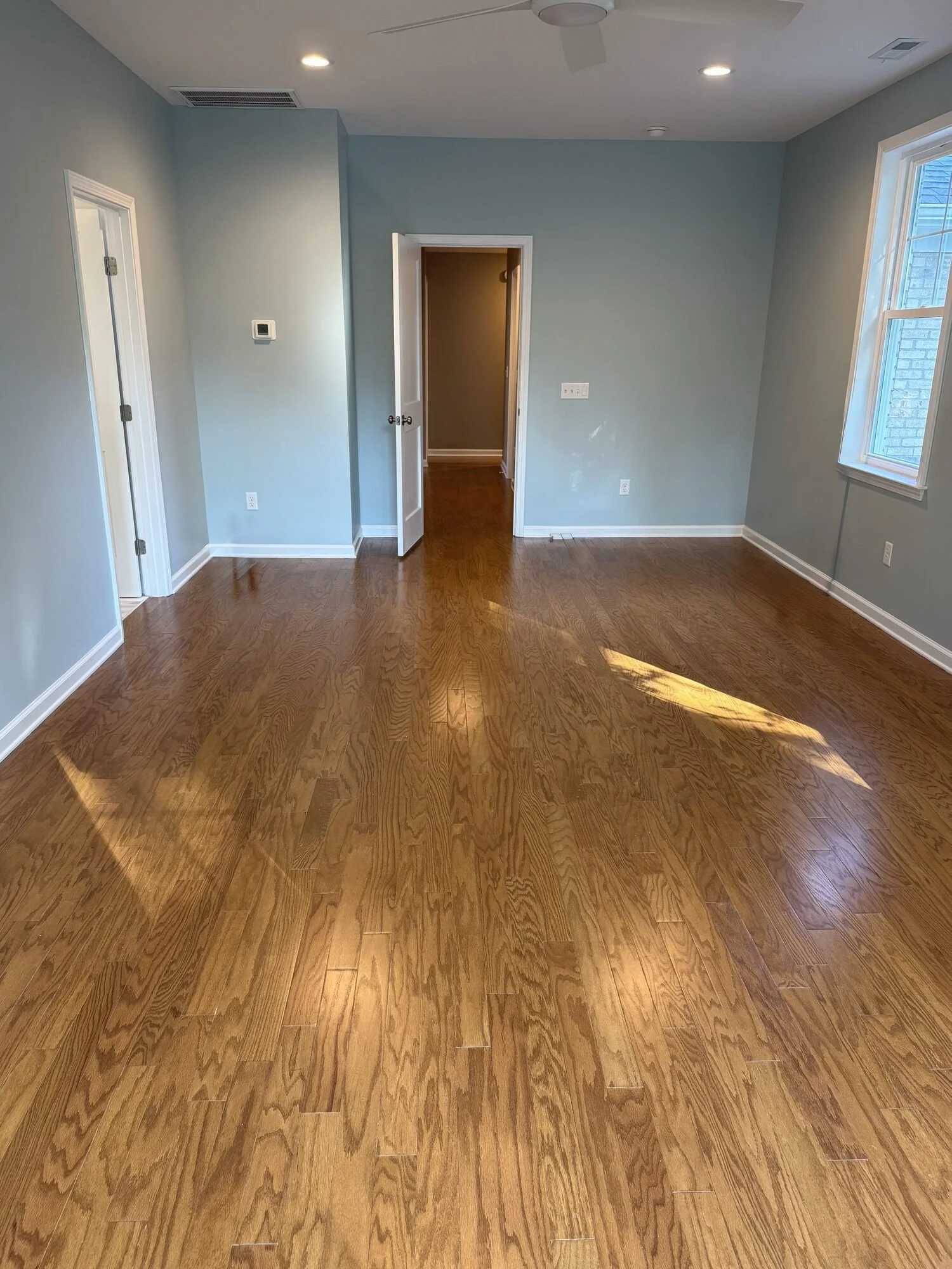 After — bedroom flowing into the new suite hallway