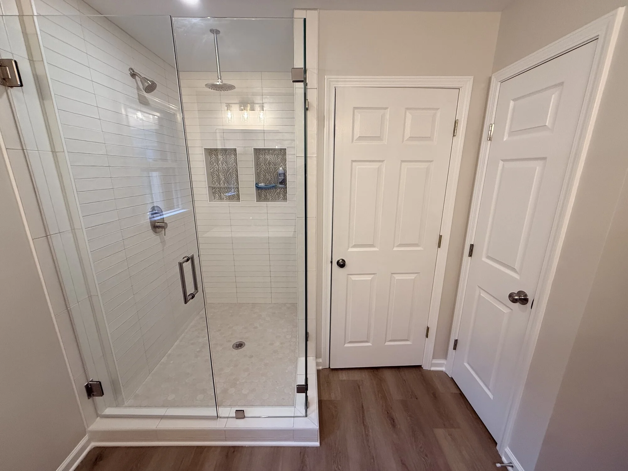 After — the reworked layout, with new walls and doors putting everything where it belongs