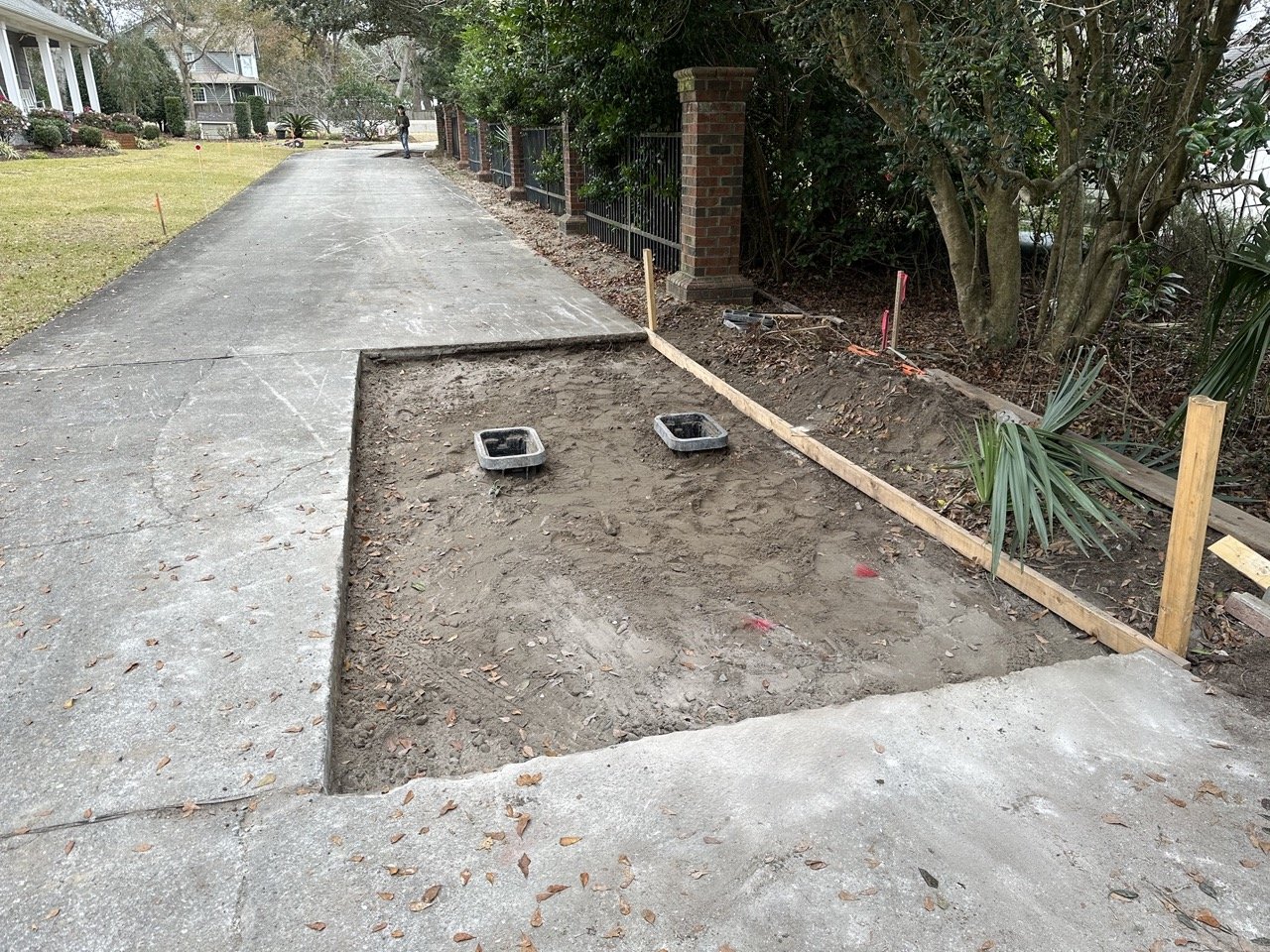 New water meter service in existing driveway