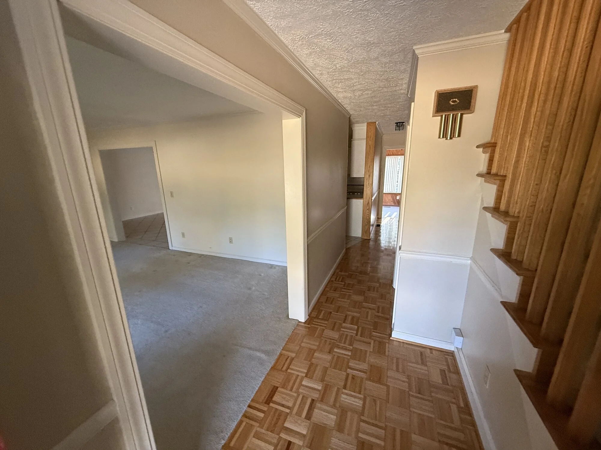 Before- Dated entryway in need of major updates.