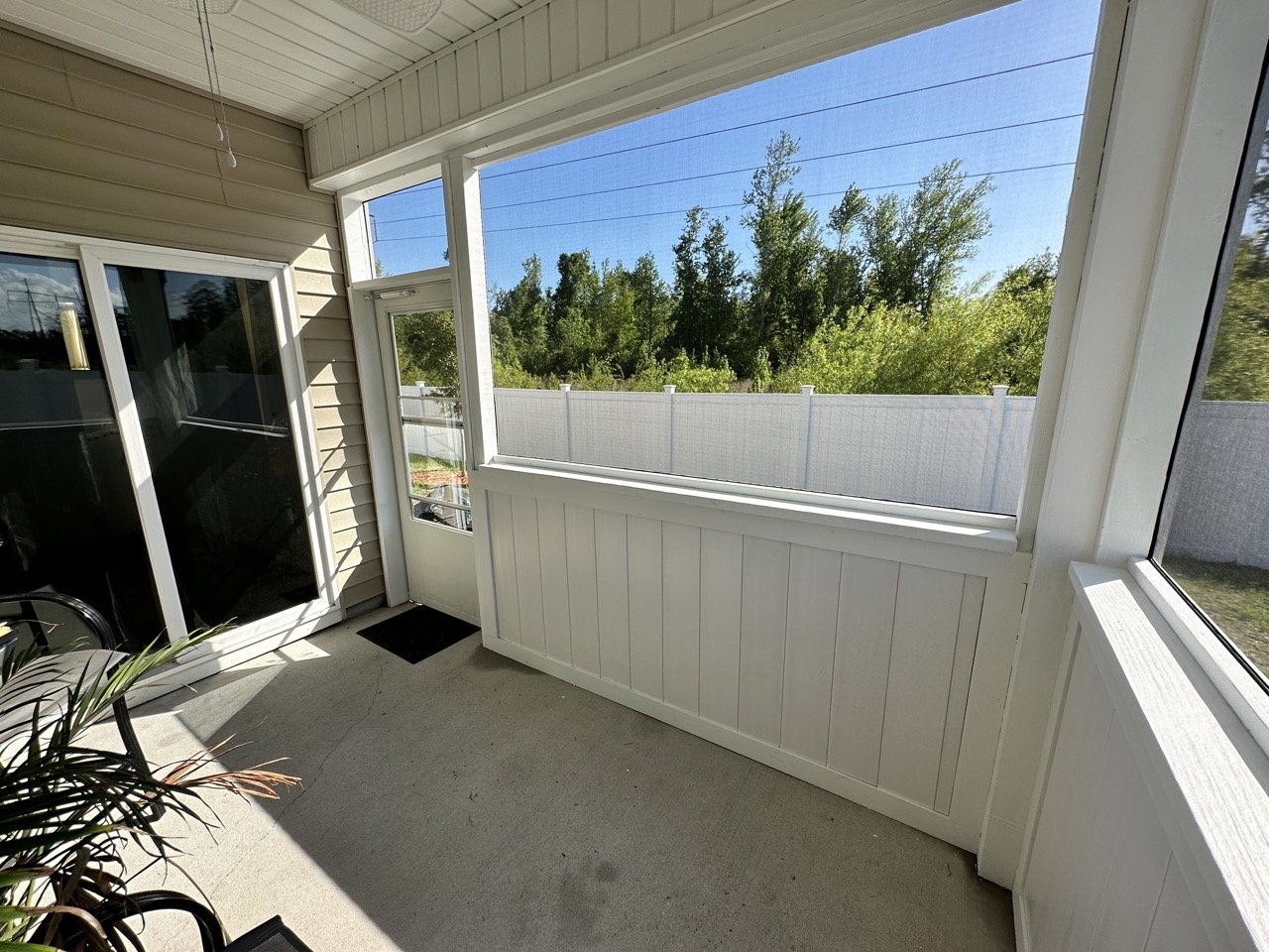 Added a half wall and screen to this covered patio