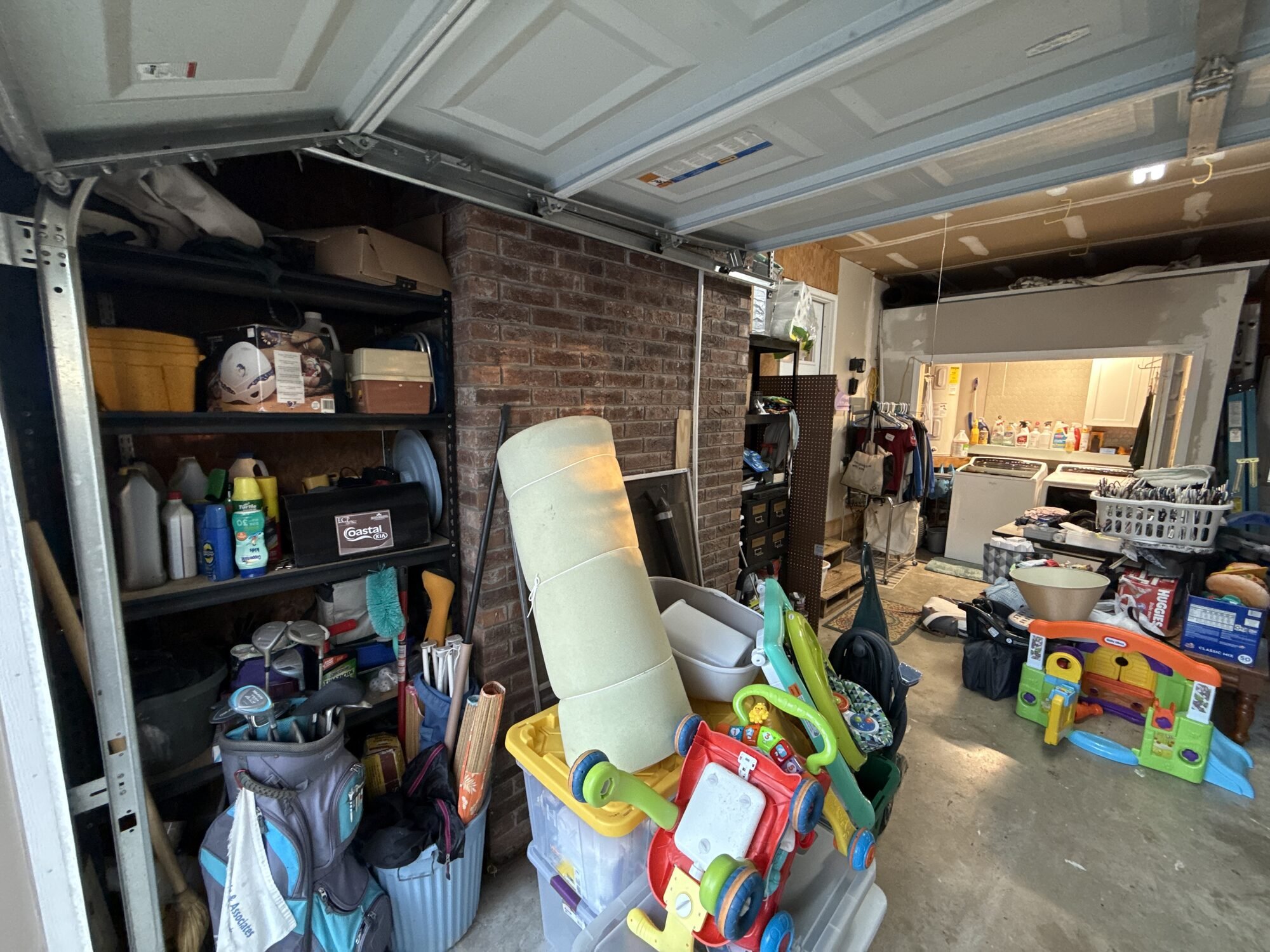 Before — wall-to-wall storage where the workspace would go
