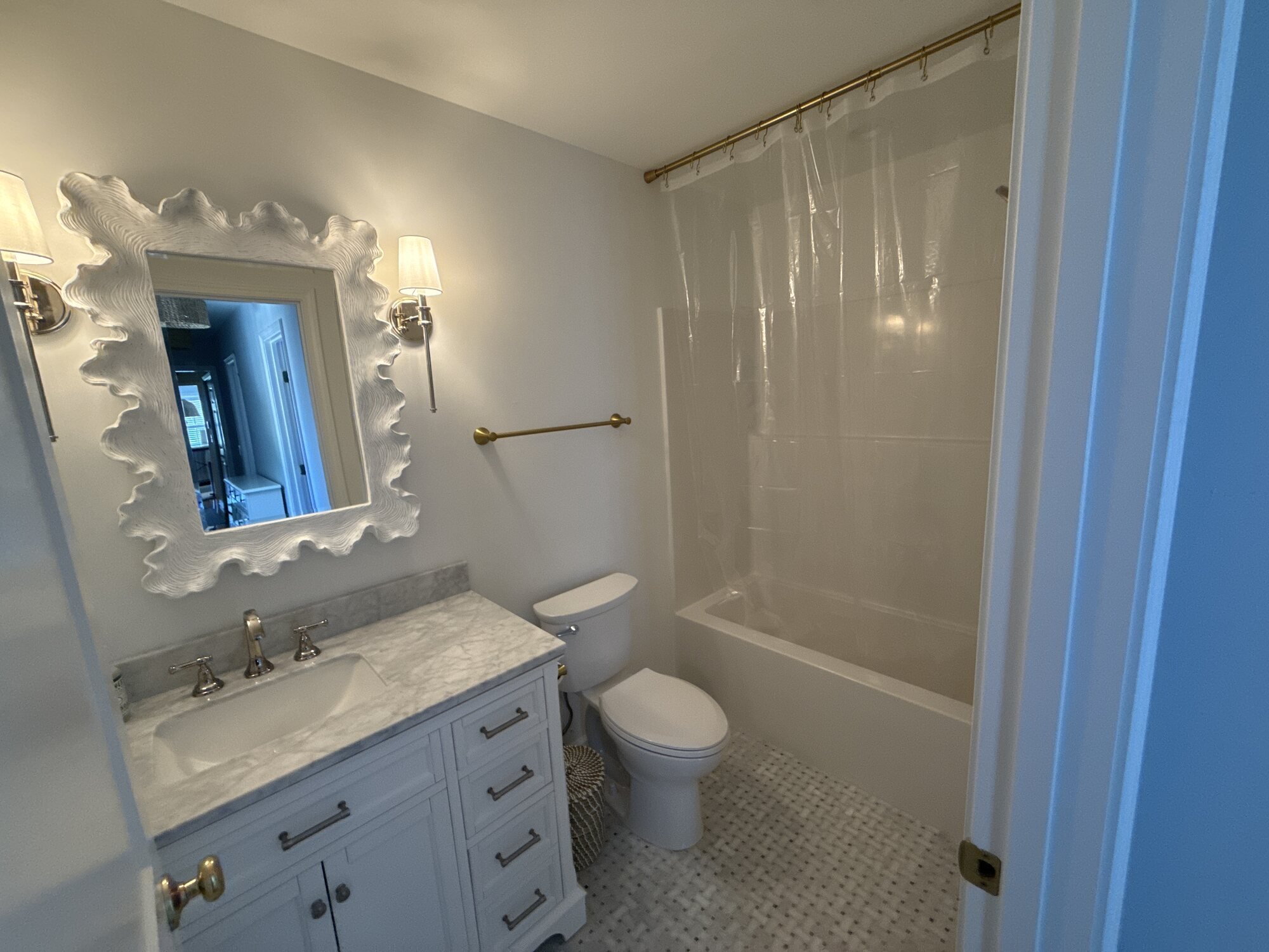 After — new bathroom with shower and modern vanity