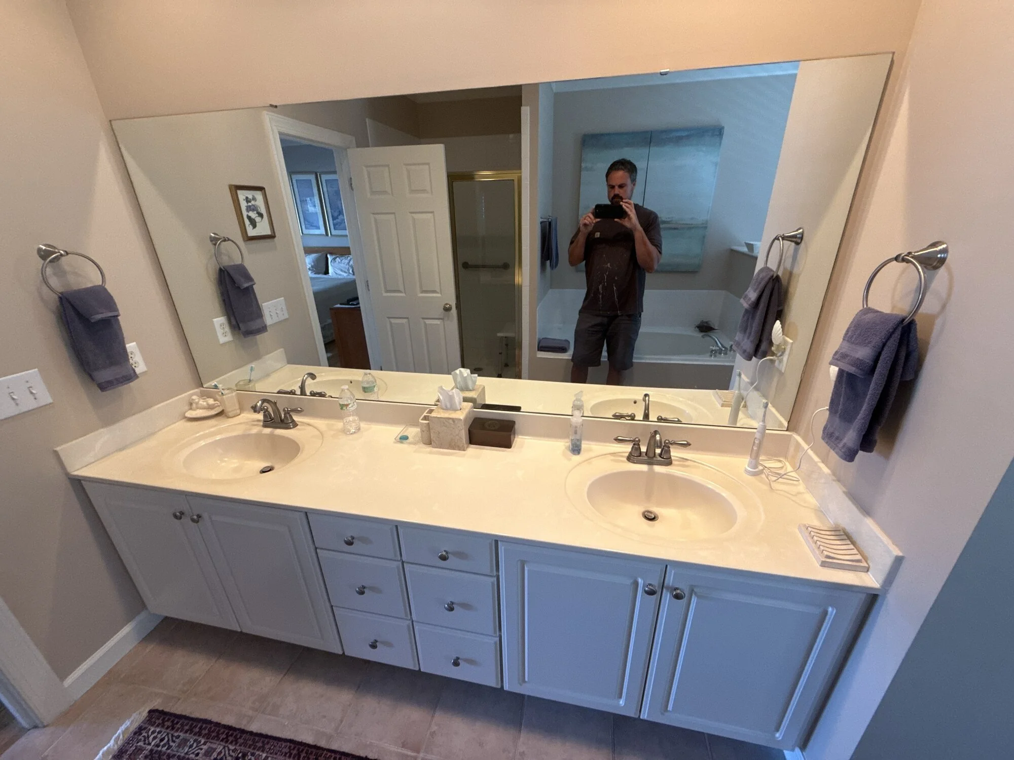 Before — the original double vanity and cultured marble top