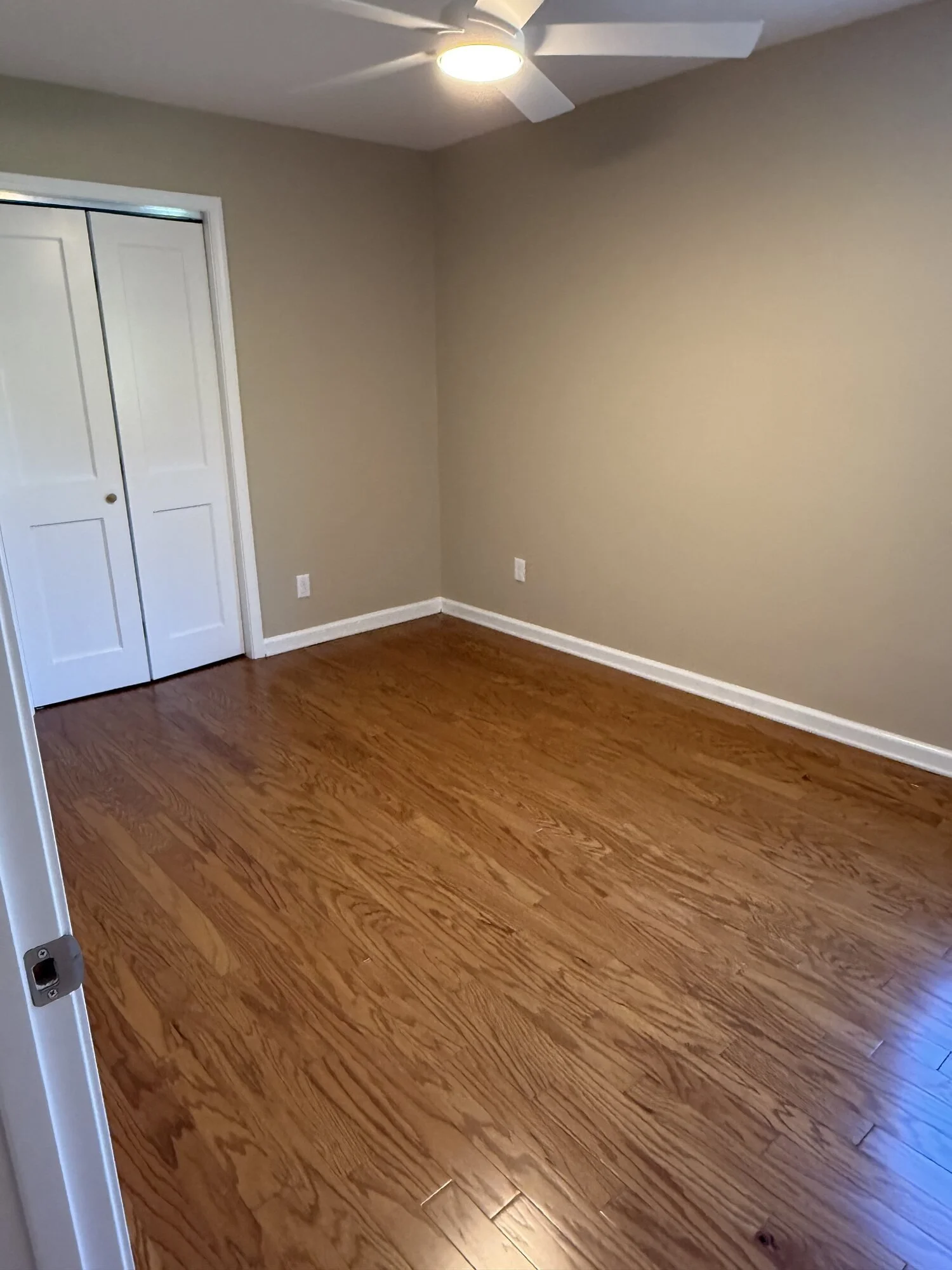 After — new hardwood flooring running through the addition