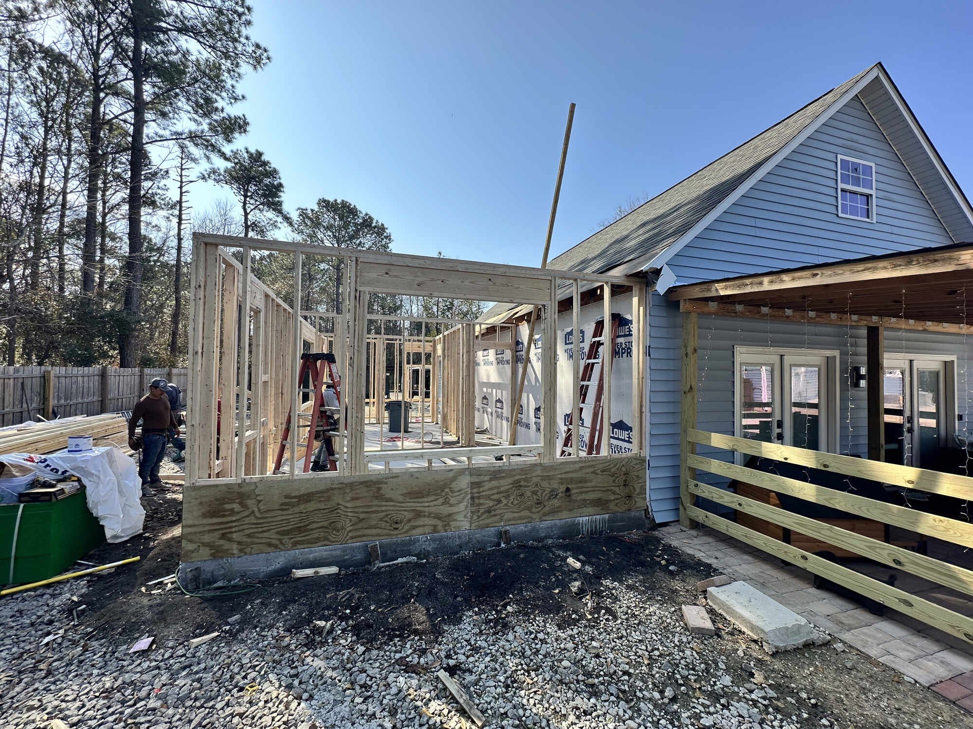 During — first walls framed and tied into the existing home