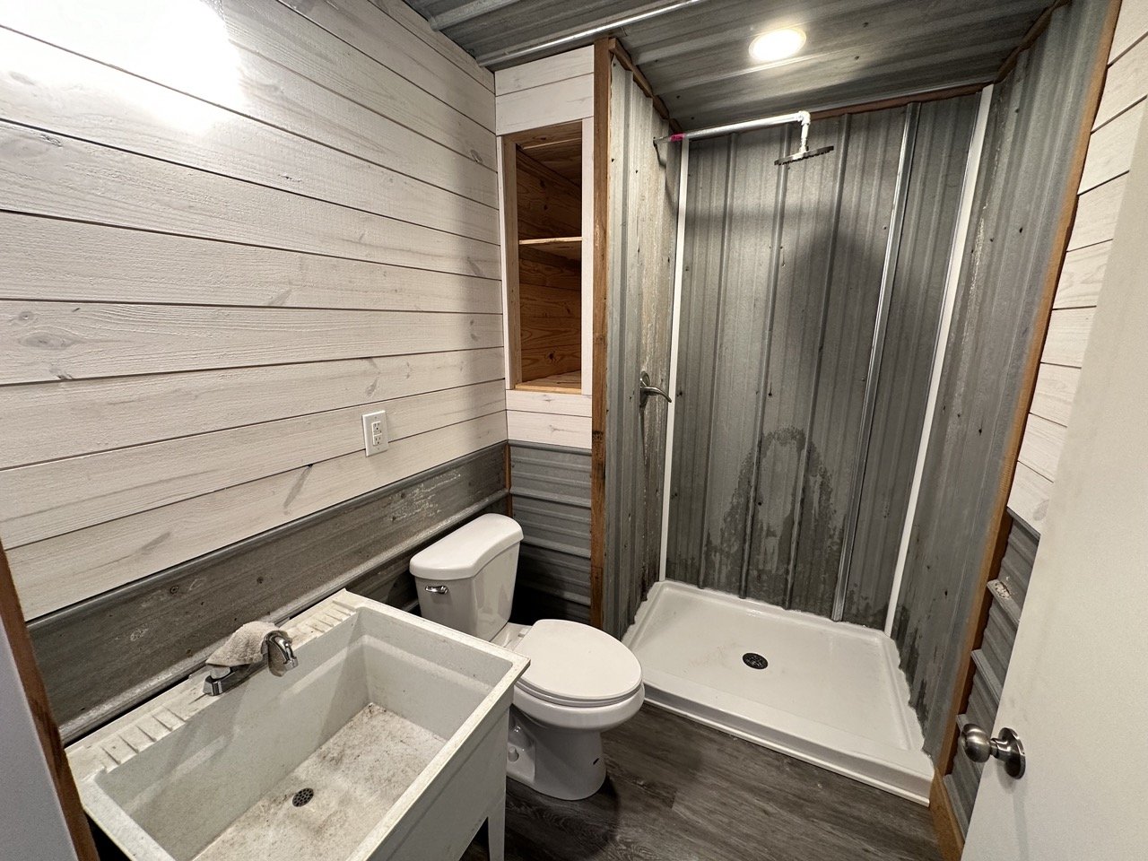 New bathroom using reclaimed barn metal