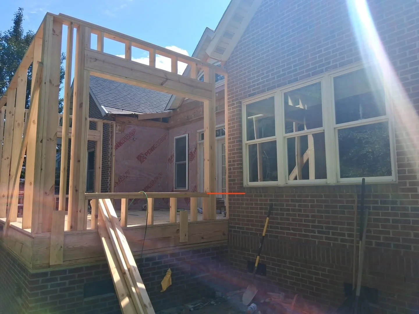 During — wall framing with the window openings 