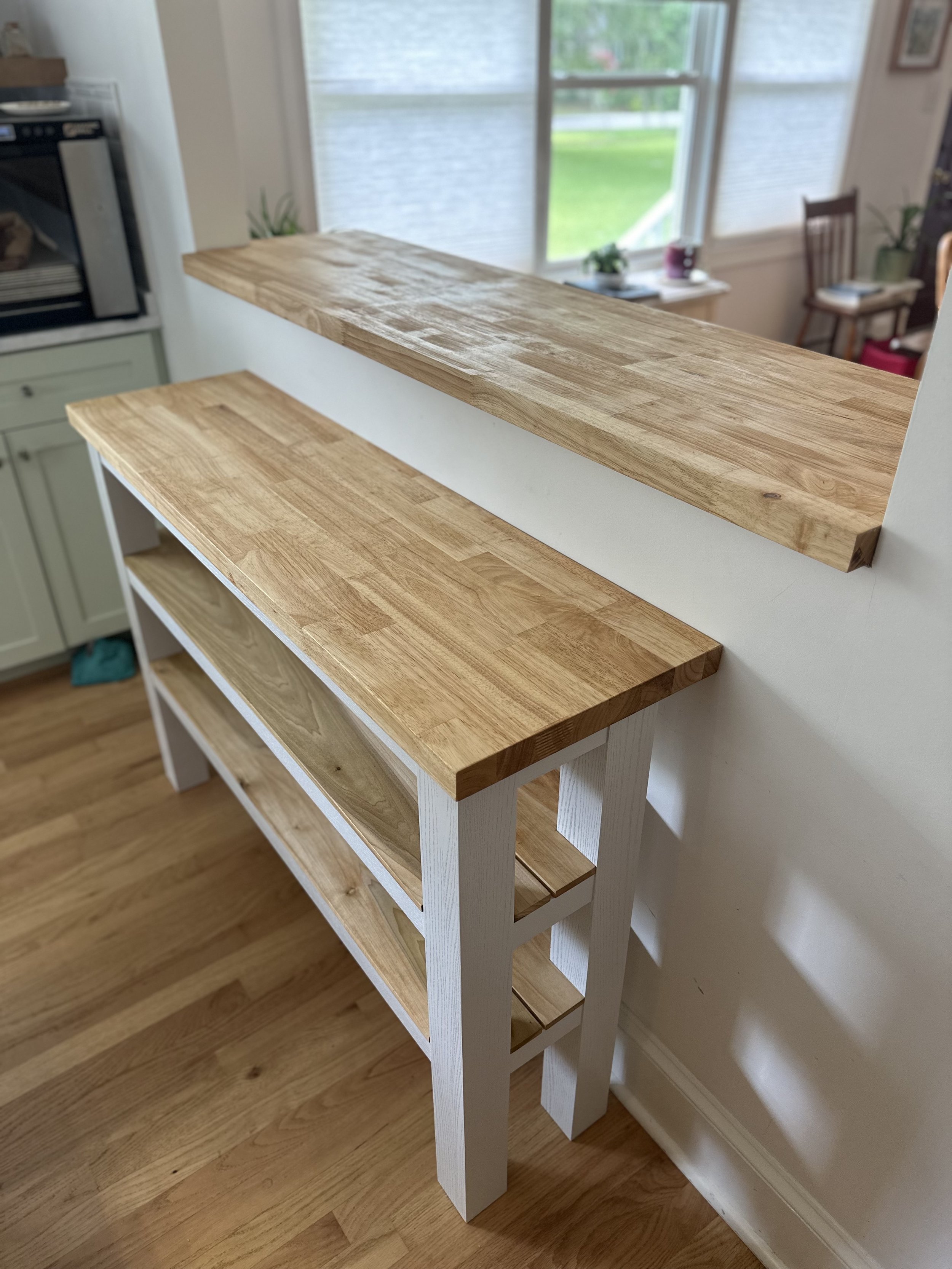 Custom kitchen work bench with matching floating bar top