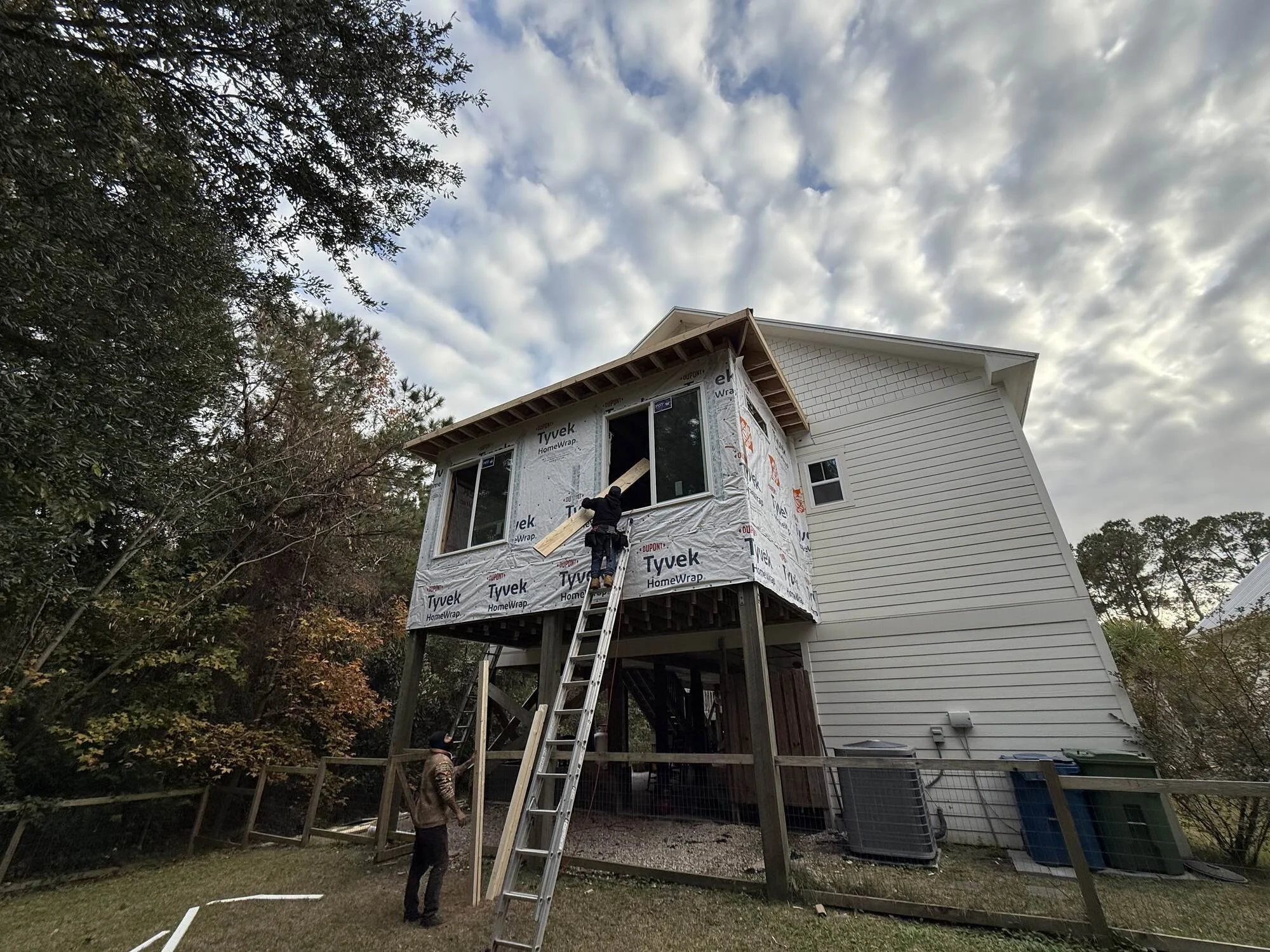 During — the elevated shell wrapped and ready for siding