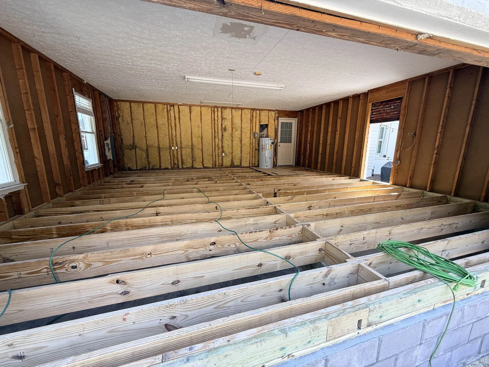 During — framing and insulation transforming the garage bay