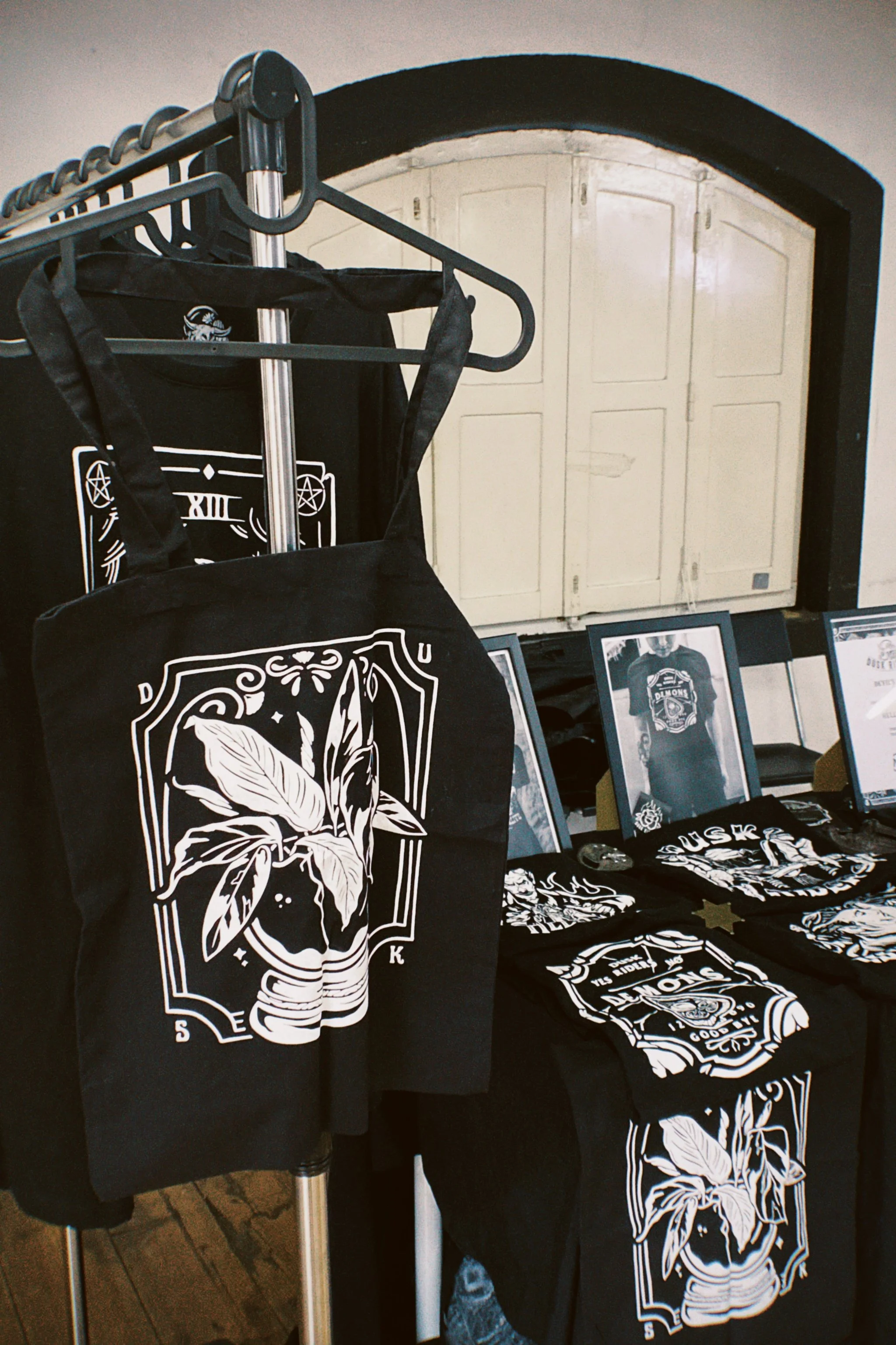 Dark fashion design at a Lisbon market flea