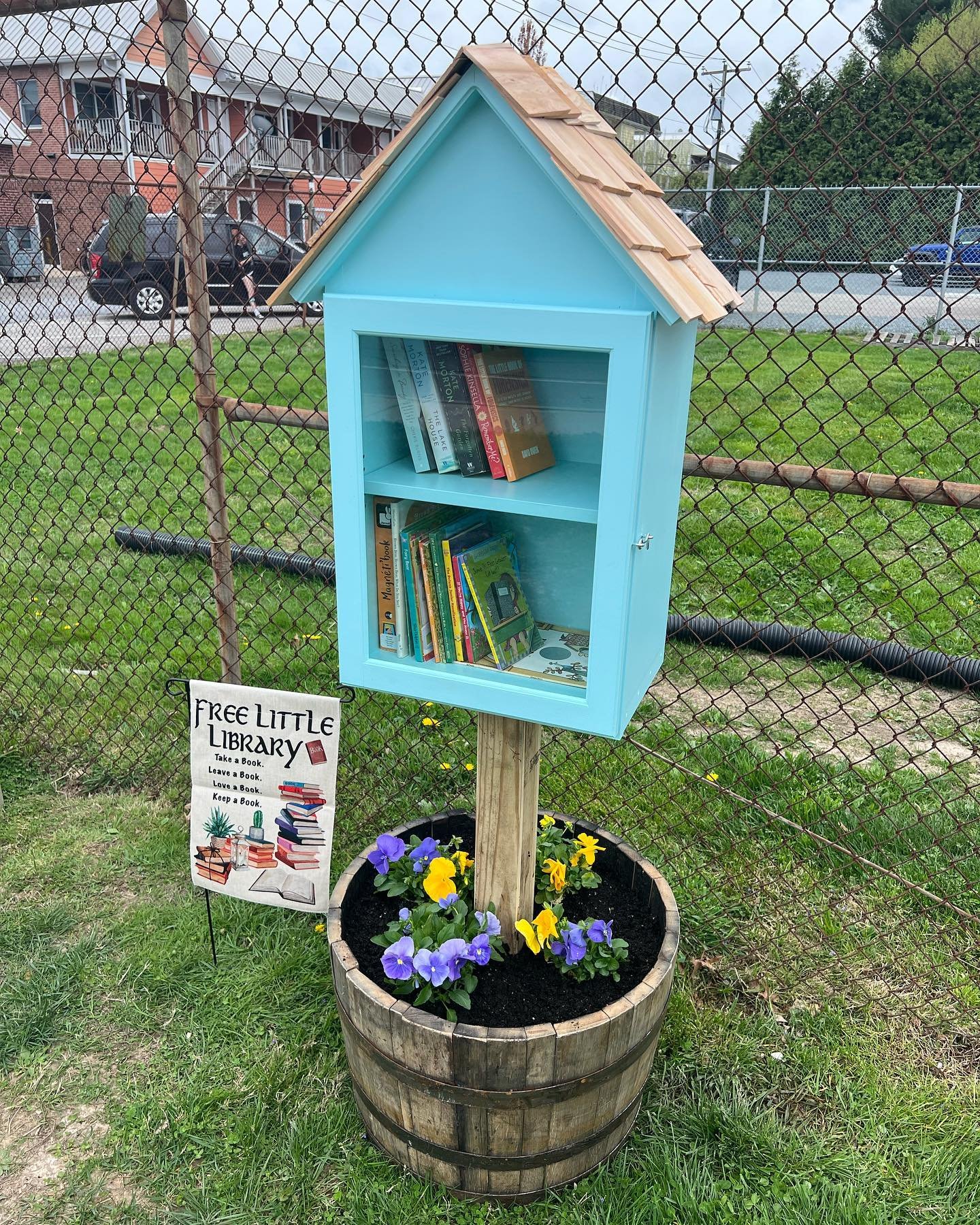 Next time you get a snowball, check out our new free little library! Take a book and/or leave a book! 📚