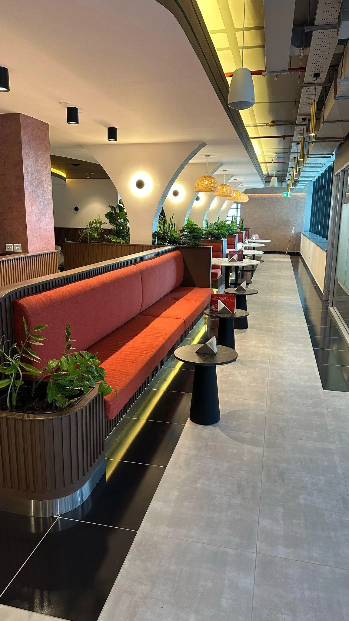 A 3D Rendering of an HQ Kenya House hallway leading to the private bar