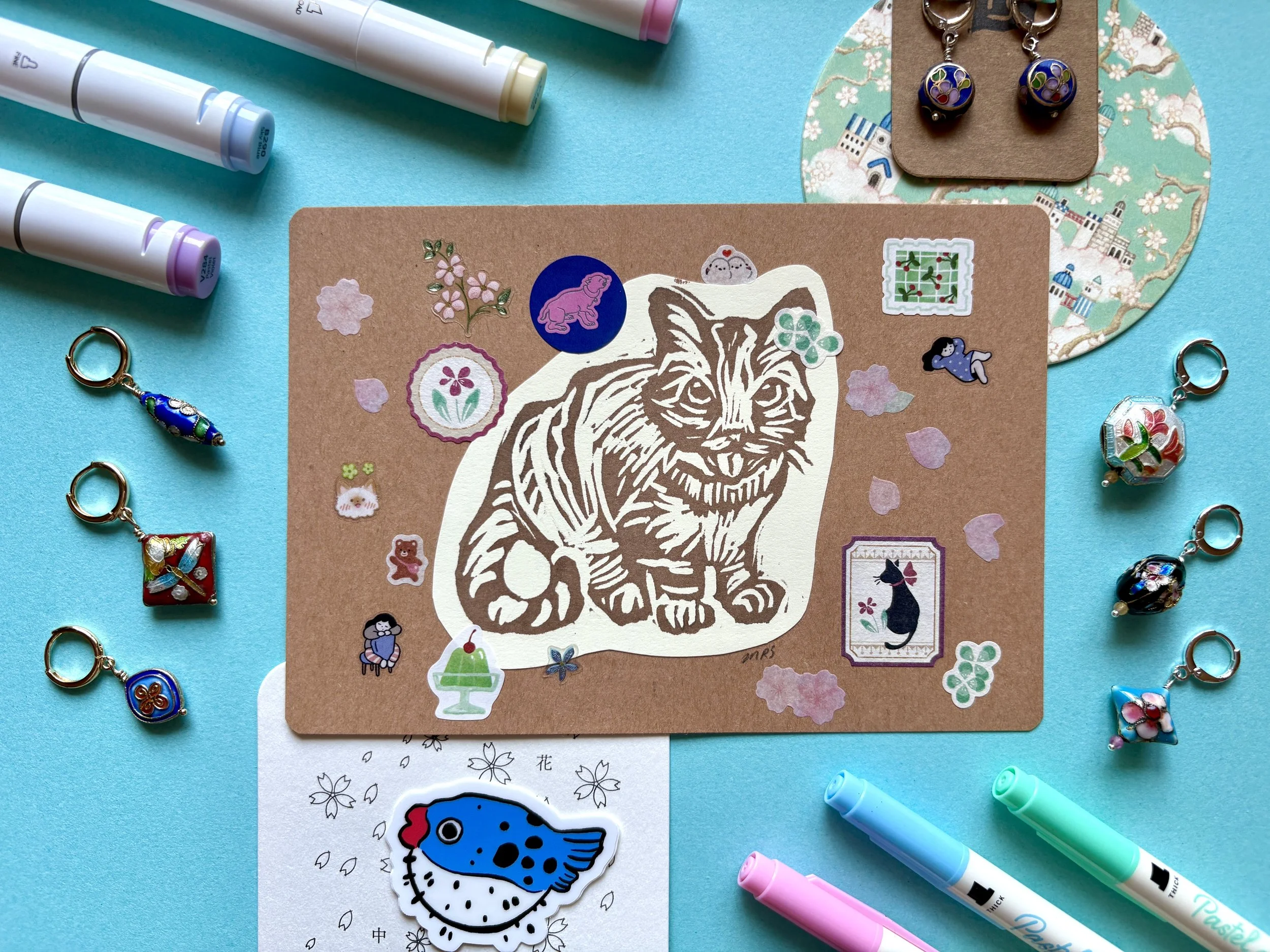 One of the biggest challenges was probably staging the photo. I haven't curated objects for a photo in a while, so I pulled coasters from my Japan trip and a blowfish sticker I designed. 