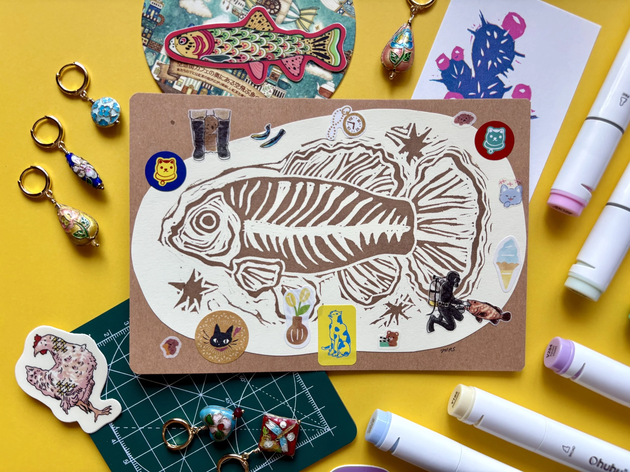 Started decorating prints with stickers I bought during a Japan trip. I have a love for fish.