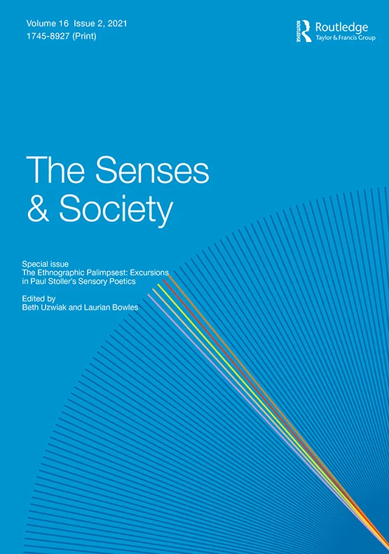 Cover of 'The Senses & Society' journal, Volume 16, Issue 2, 2021, featuring a special issue on 'The Ethnographic Palimpsest: Excursions in Paul Stoller’s Sensory Poetics' edited by Beth Uzwiak and Laurian Bowles. Published by Routledge, with a blue background and radiating lines design.