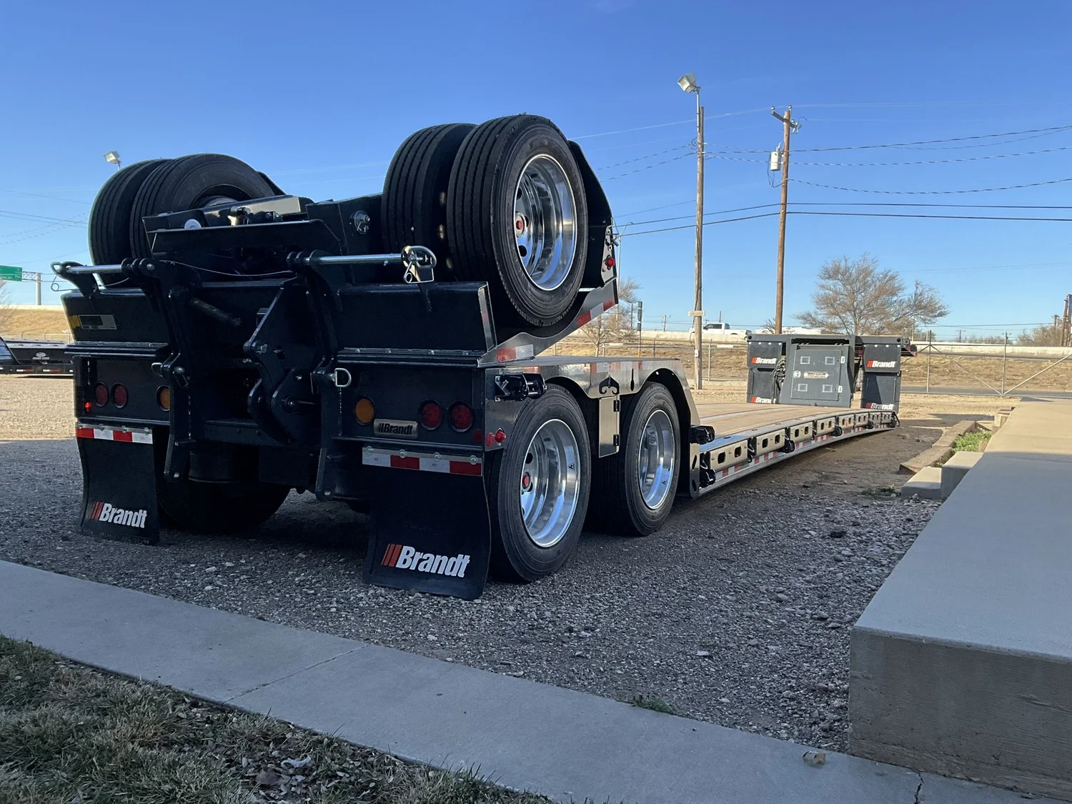Brandt agricultural RGN detach trailer with flip axle