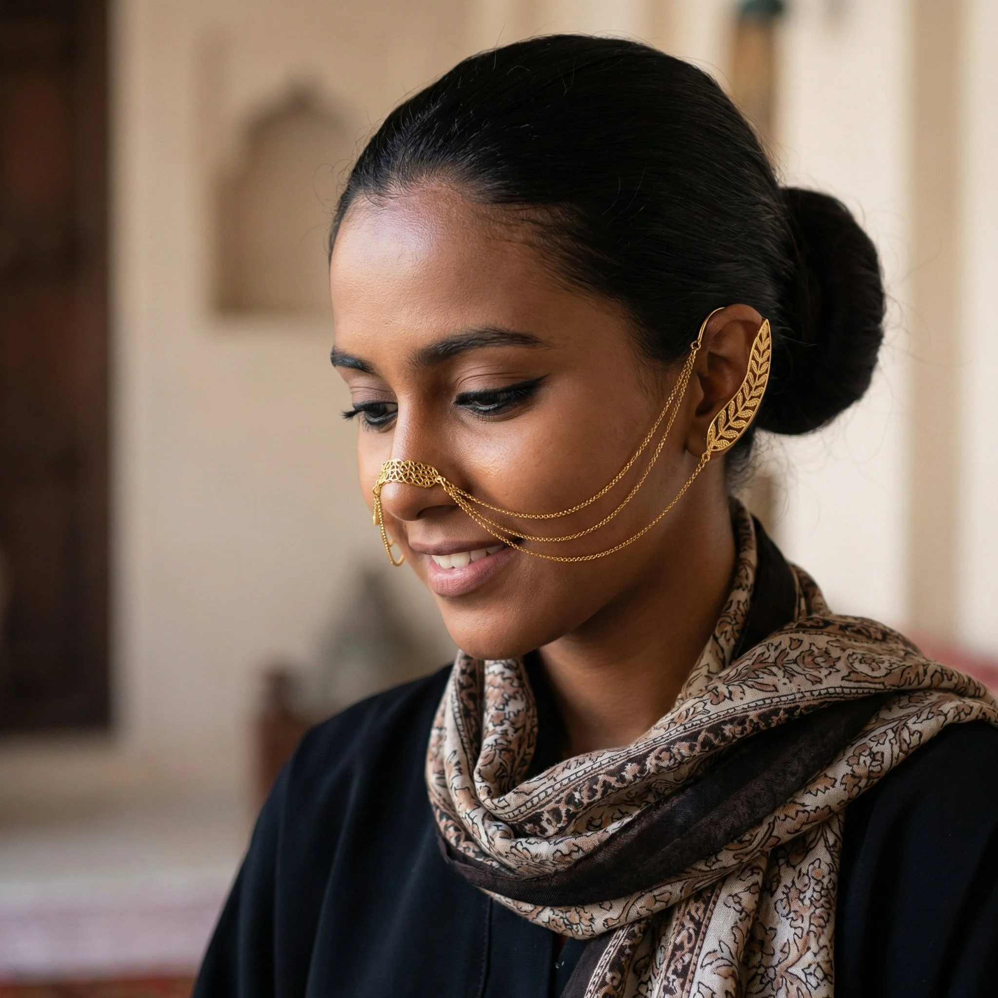 Re-imagining the Emirati Battoulah as jewelry of armor and protection for today. This version is a more subtle nod to the tradition.