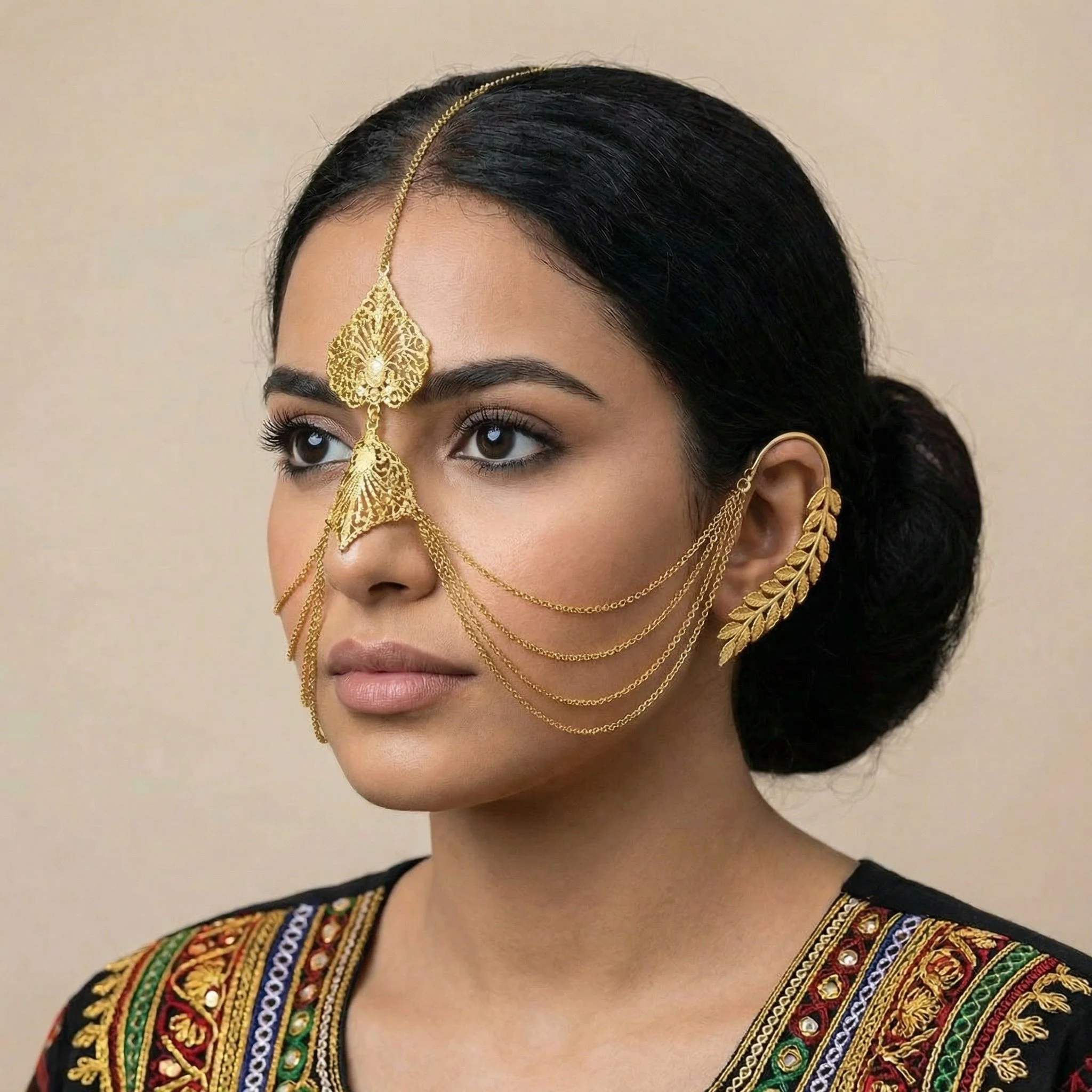 Re-imagining the Emirati Battoulah as jewelry of armor and protection for today. This version picks up the vertical lines of the traditional face mask worn to protect against sandstorms.