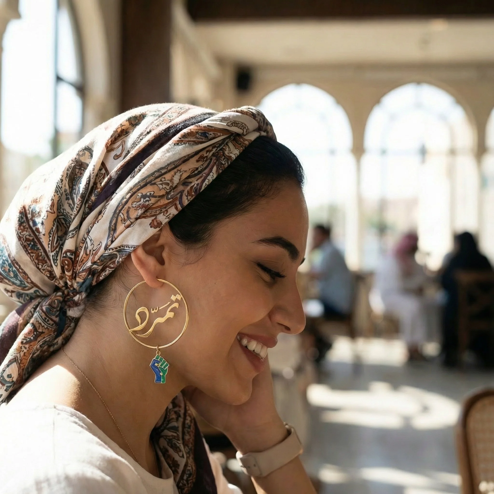 This is the first of a series where our values are translated as wearable and modern jewelry. This piece centers the Arabic word "Tamarrud" meaning "to resist" with the symbolic fist in enamel dangling below. Words and action together in harmony.