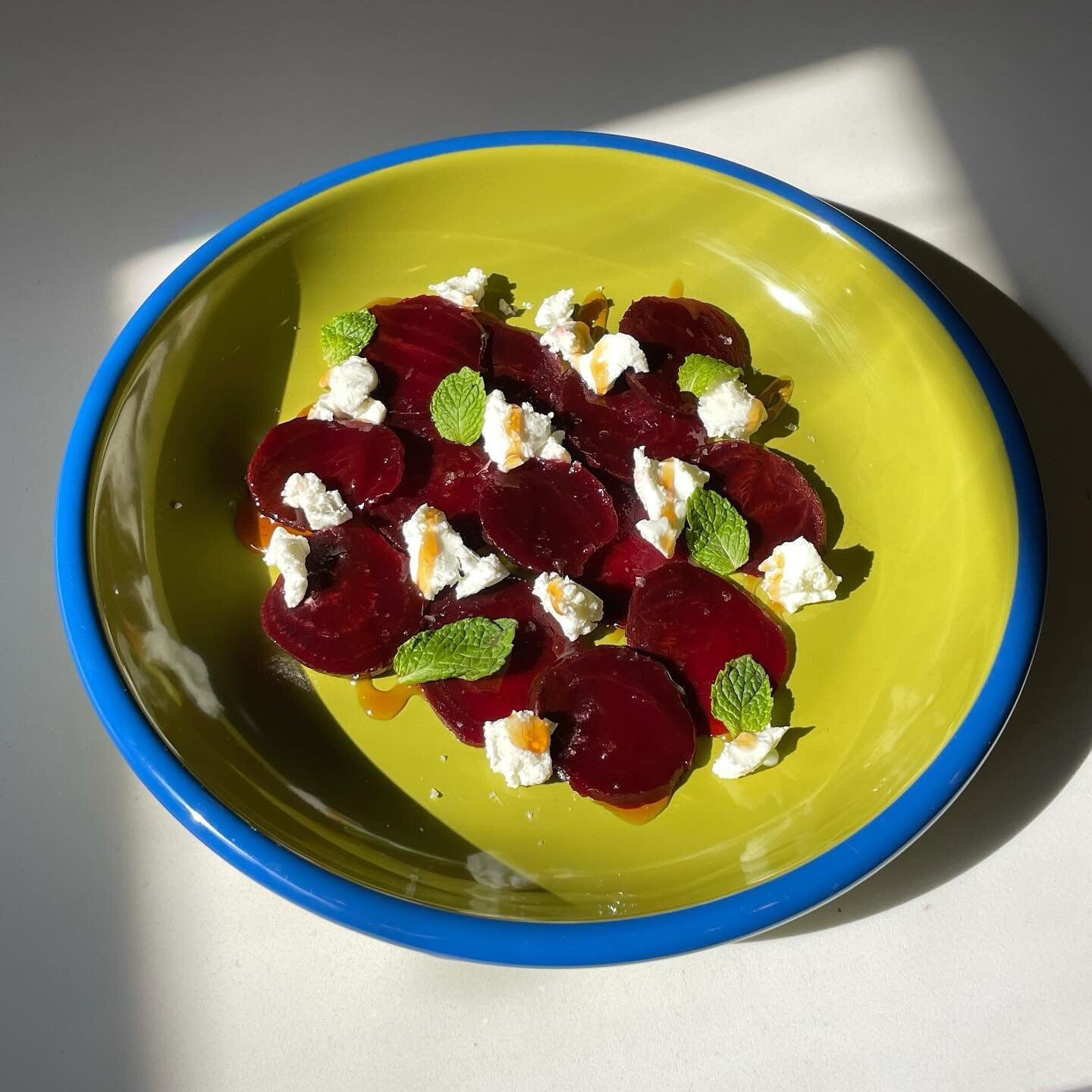 Every year I try to give beets a shot and every year I remember that I don't like them! They taste like dirt! Anyway... sliced beets, globs of goat cheese, mint, and a drizzle of hot honey