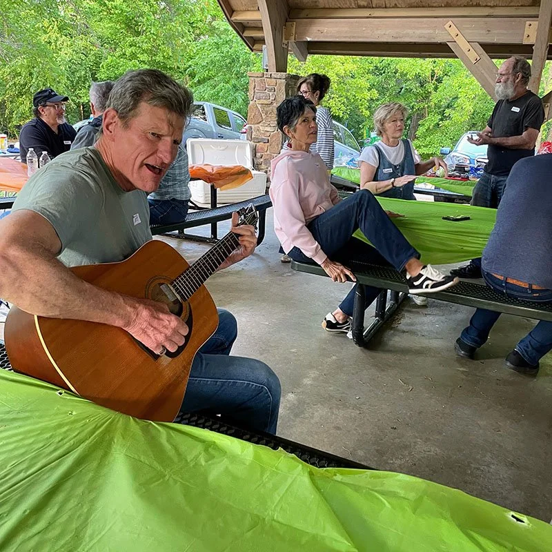playing guitar at SAGE gathering