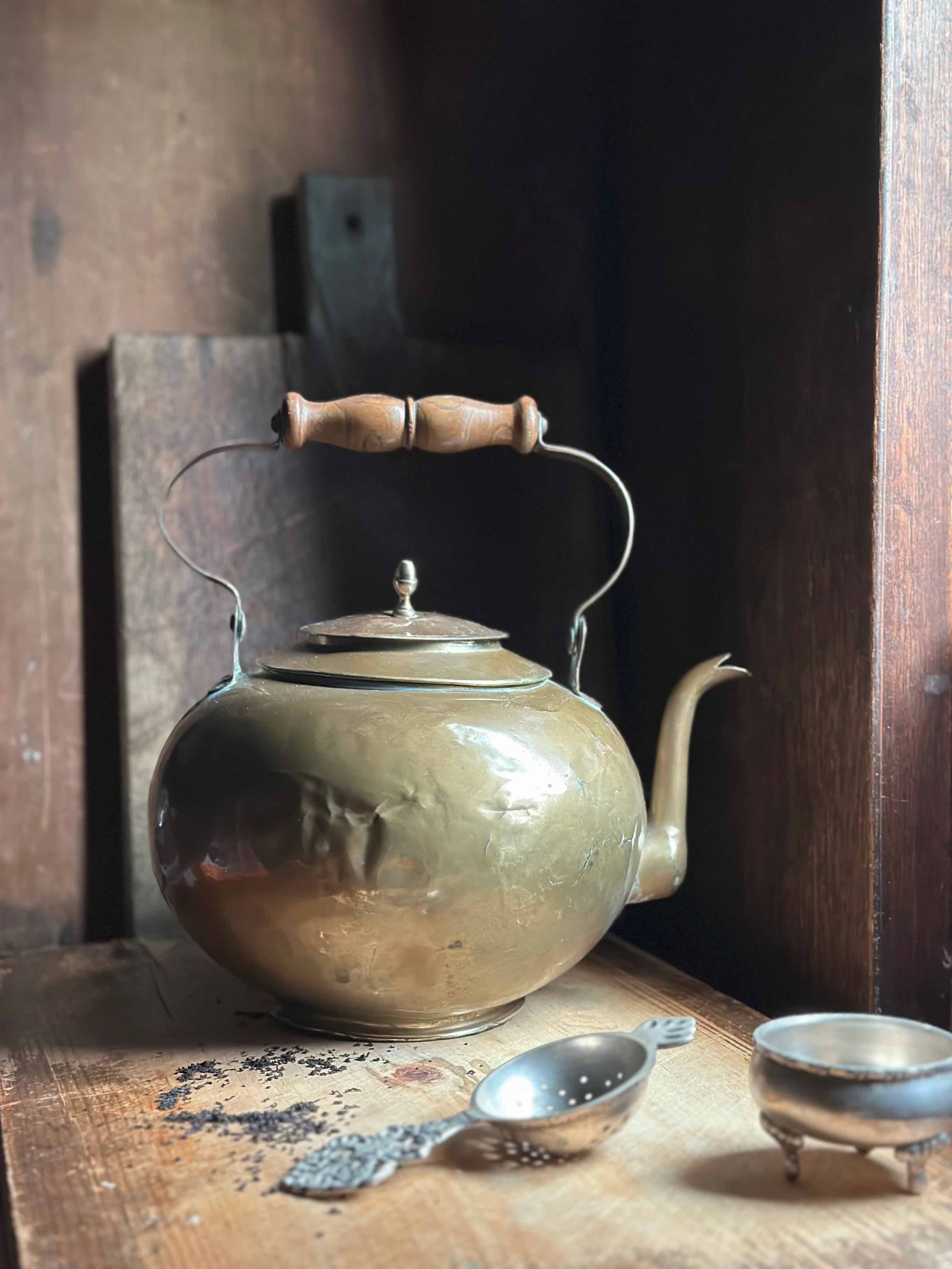 An old brass tea pot