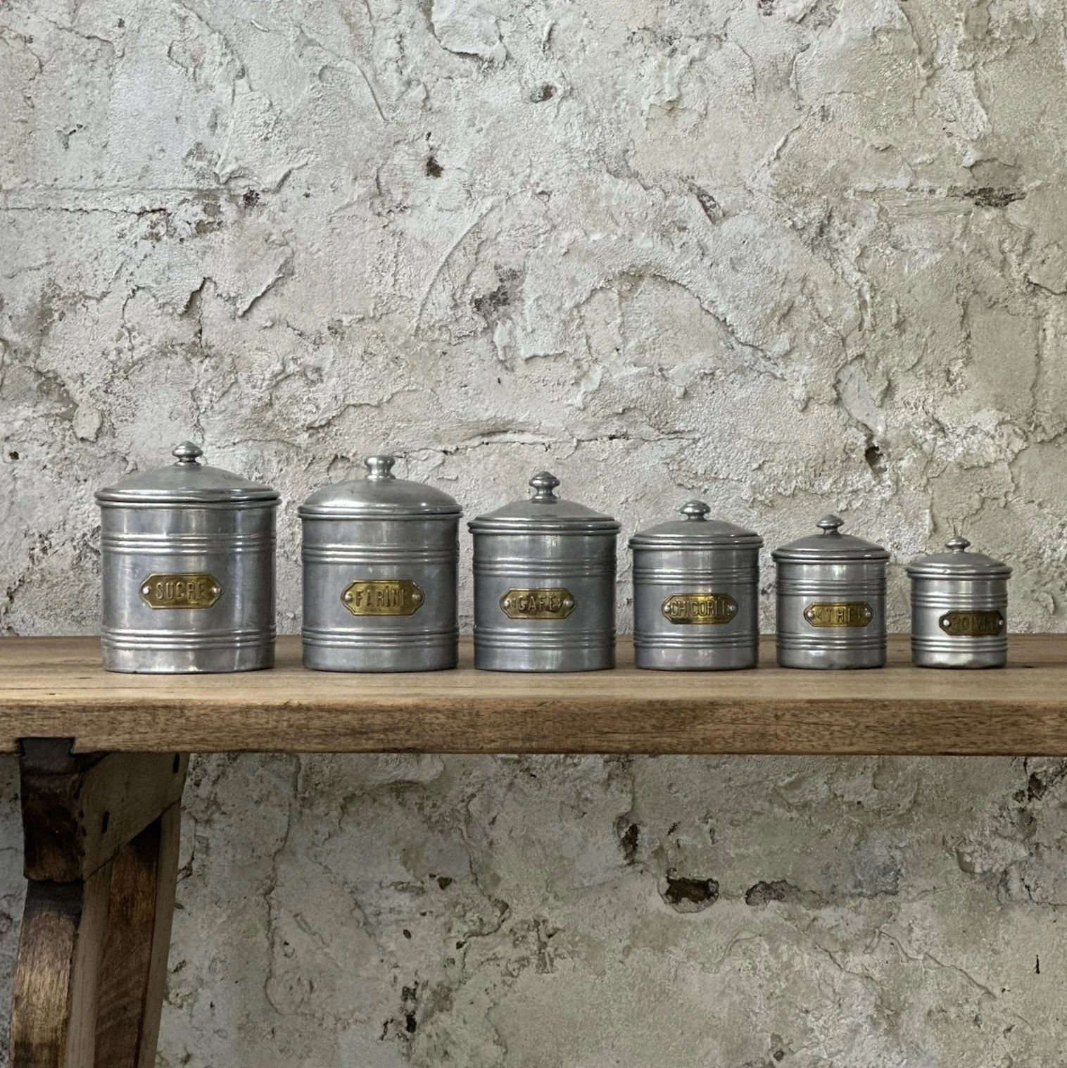 A set of six French cannisters