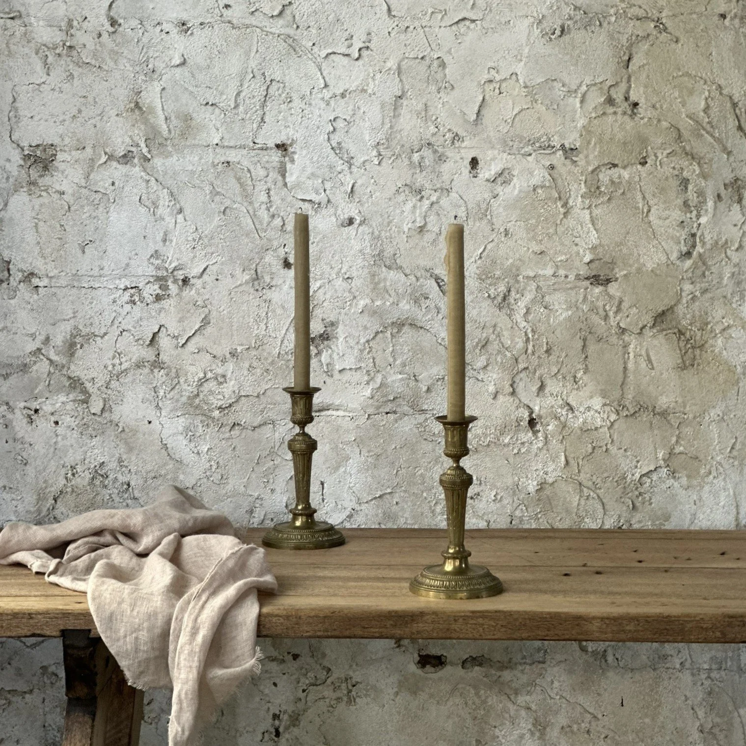 A pair of brass candleholders
