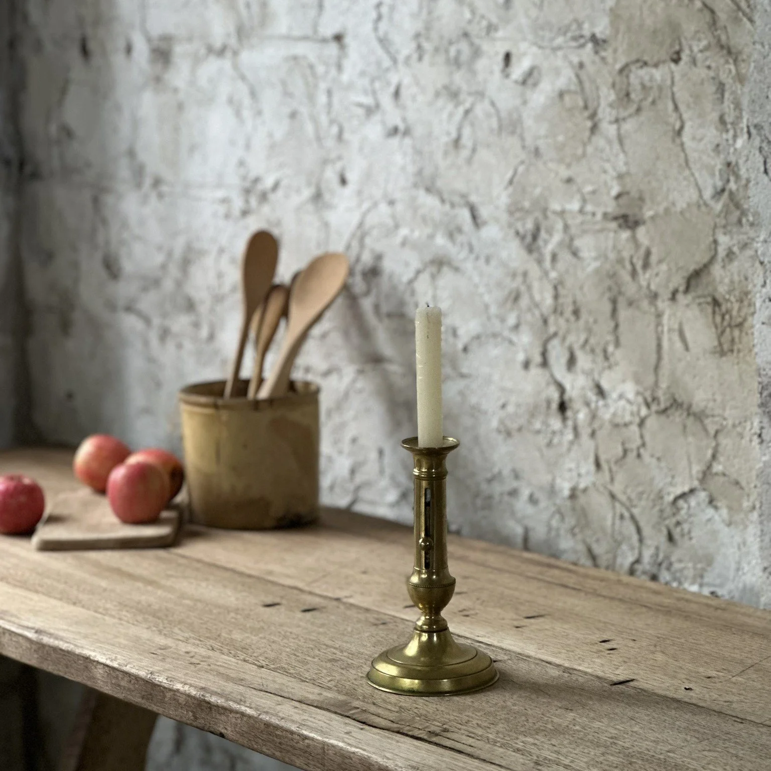 Brass candleholder with side adjuster