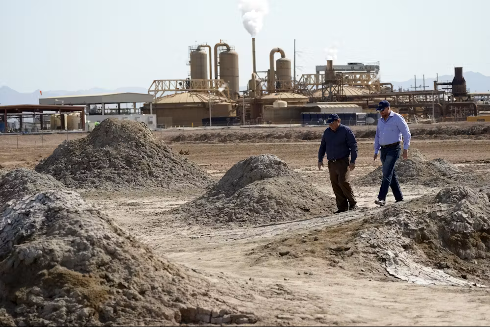 Controlled Thermal Resources CEO Rod Colwell, right, walks near the Salton Sea with a colleague. AP Photo/Marcio Jose Sanchez