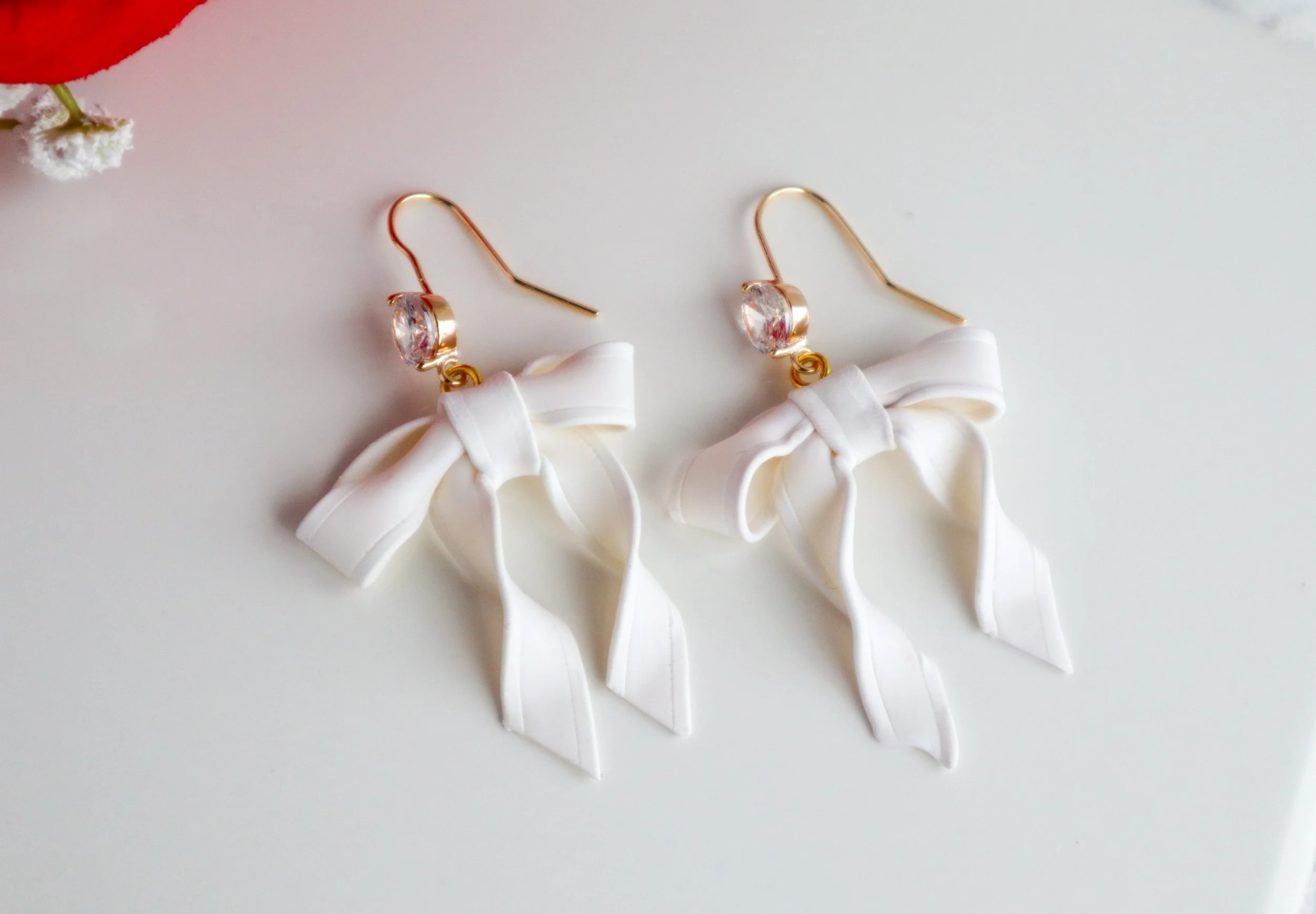 Translucent White Bow Earrings (S)