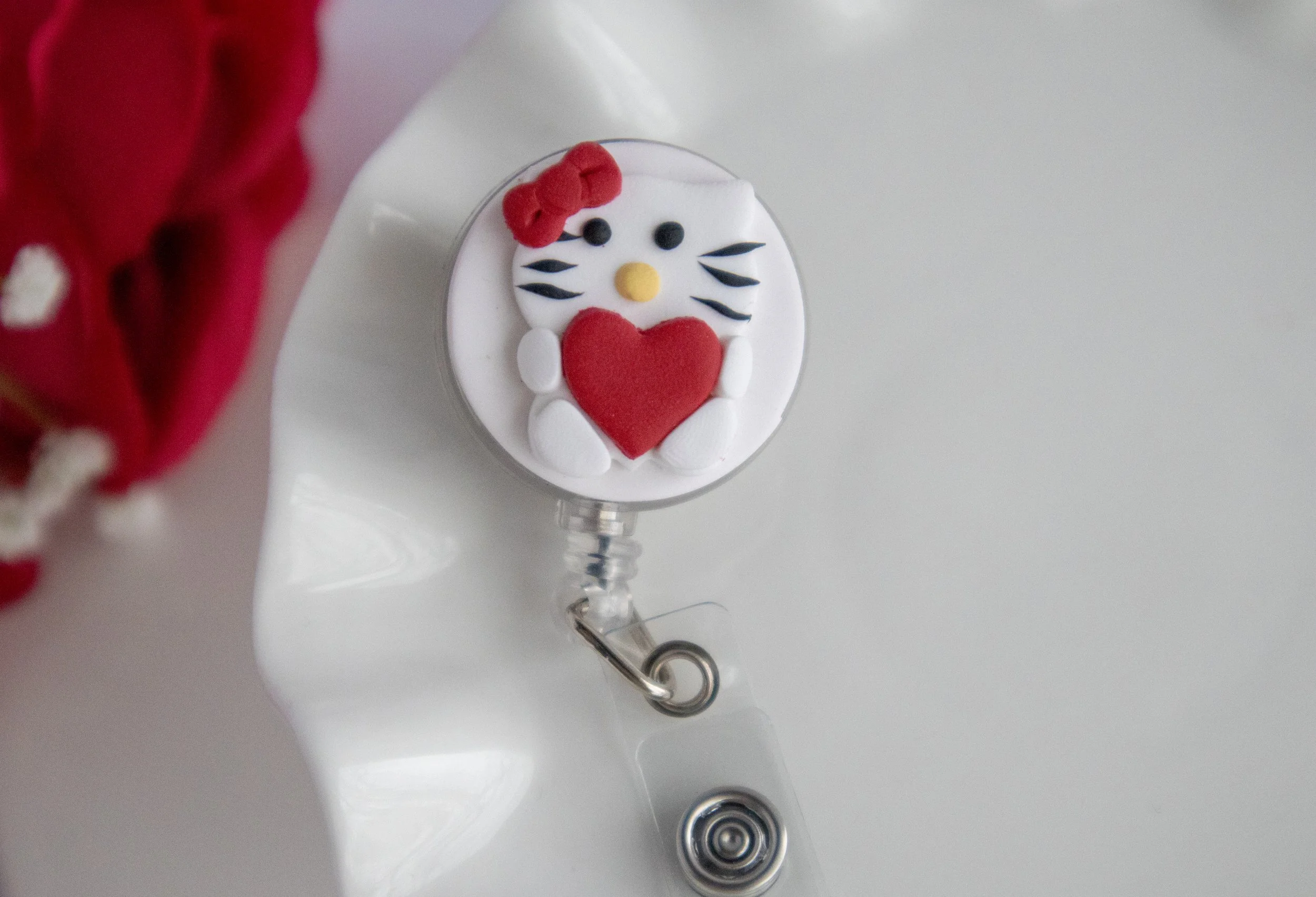 Hello Kitty Heart Badge Reel