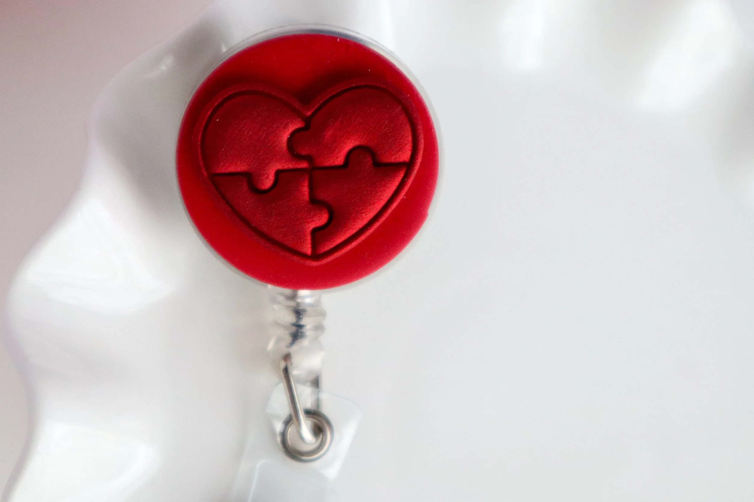 Puzzle Heart Badge Reel