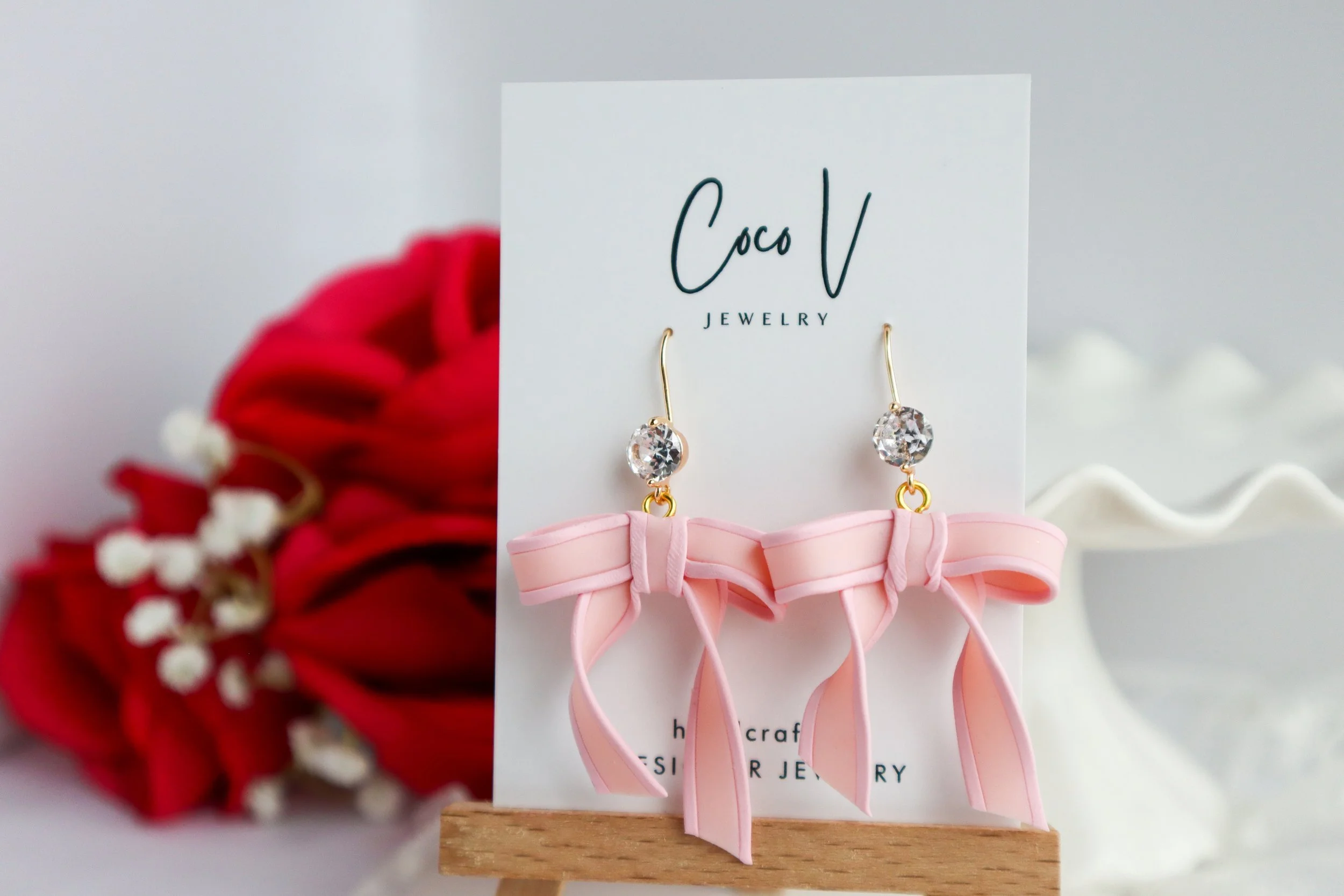 Translucent Pink Bow Earrings