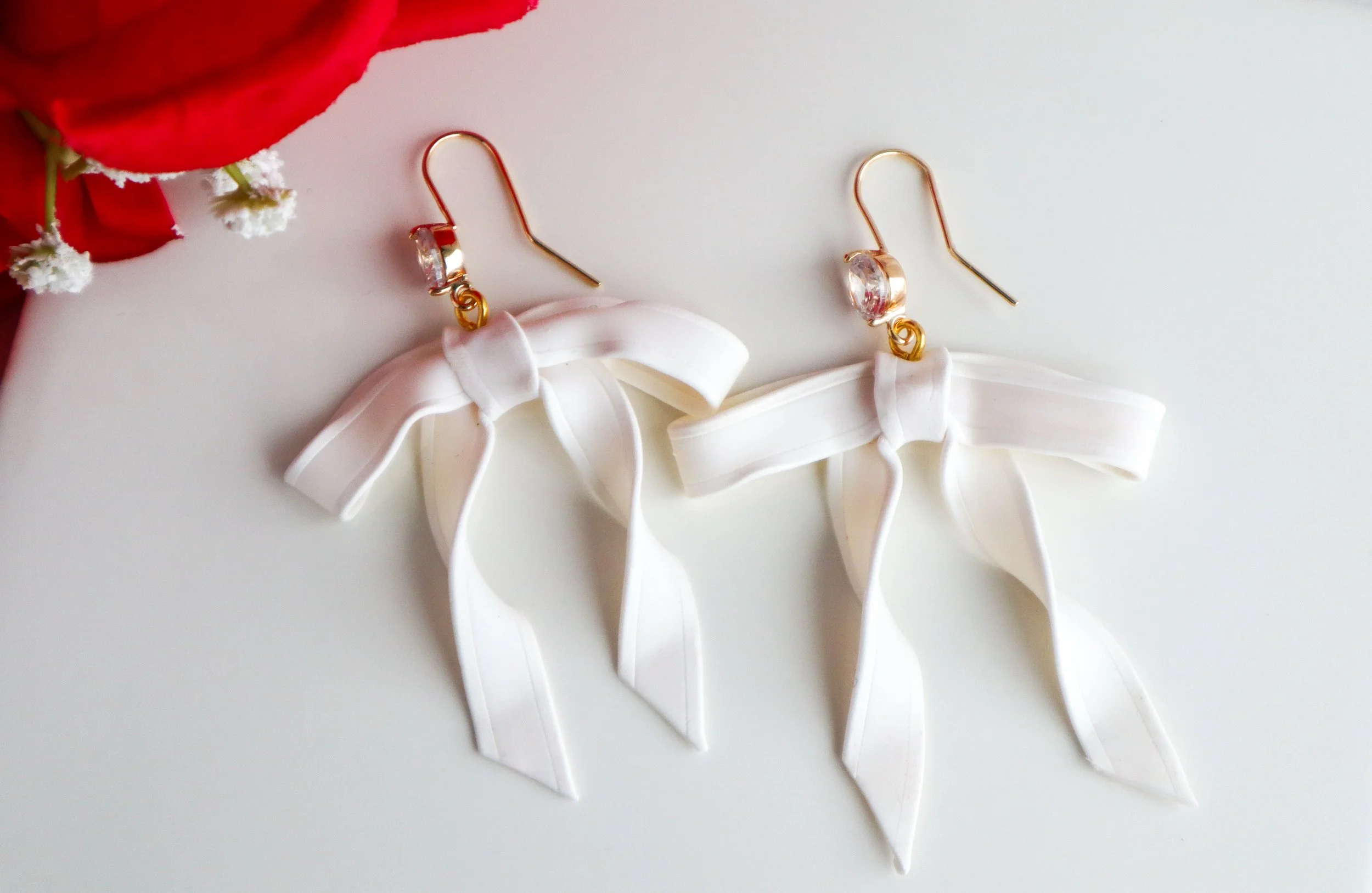 Translucent White Bow Earrings (L)