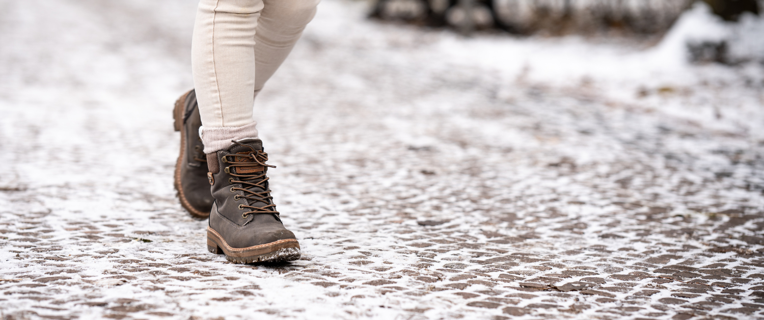 Winter walking on a frosty path, reflecting slow, gentle movement.
