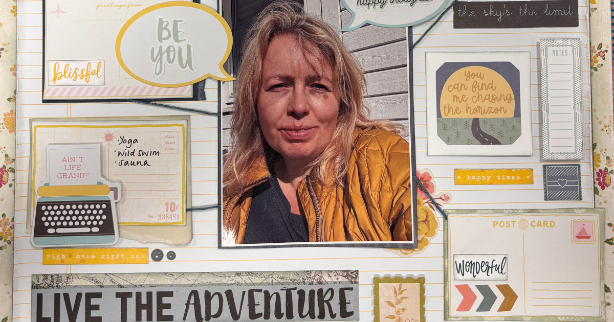 Completed scrapbook page outdoors with travel themed journaling and decorative paper elements.