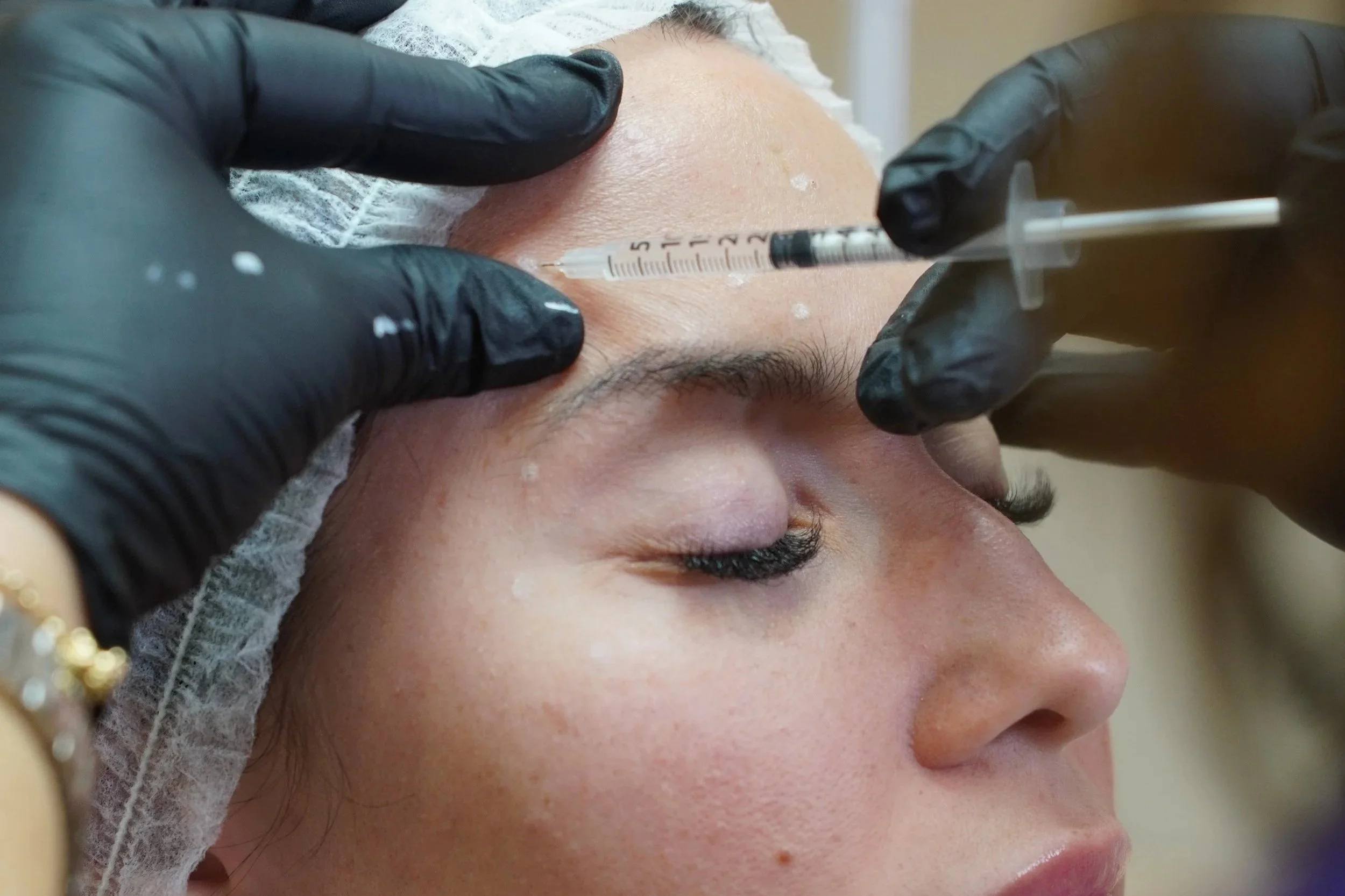 young women getting injected with dysport at vellu laser