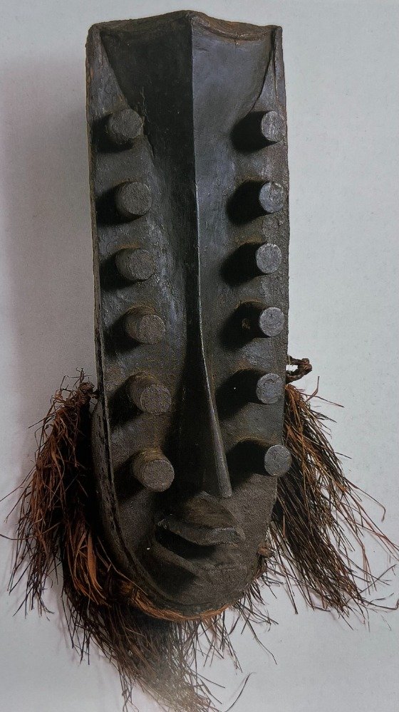Kru. Many-eyed mask.
Ivory Coast
20th century
Wood, vegetable fibre
Musée Ethnographique de Dakar. (Photo: Phillips, Tom, ed. Africa : The Art of a Continent. London: Prestel, 1996. 465.)