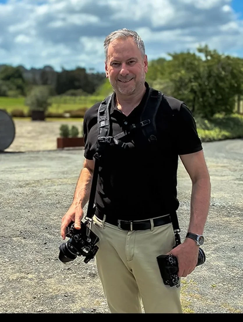 StreetsCreative photographer wearing a Black Rapid Dual with two cameras attached ready to start his event photo shoot.