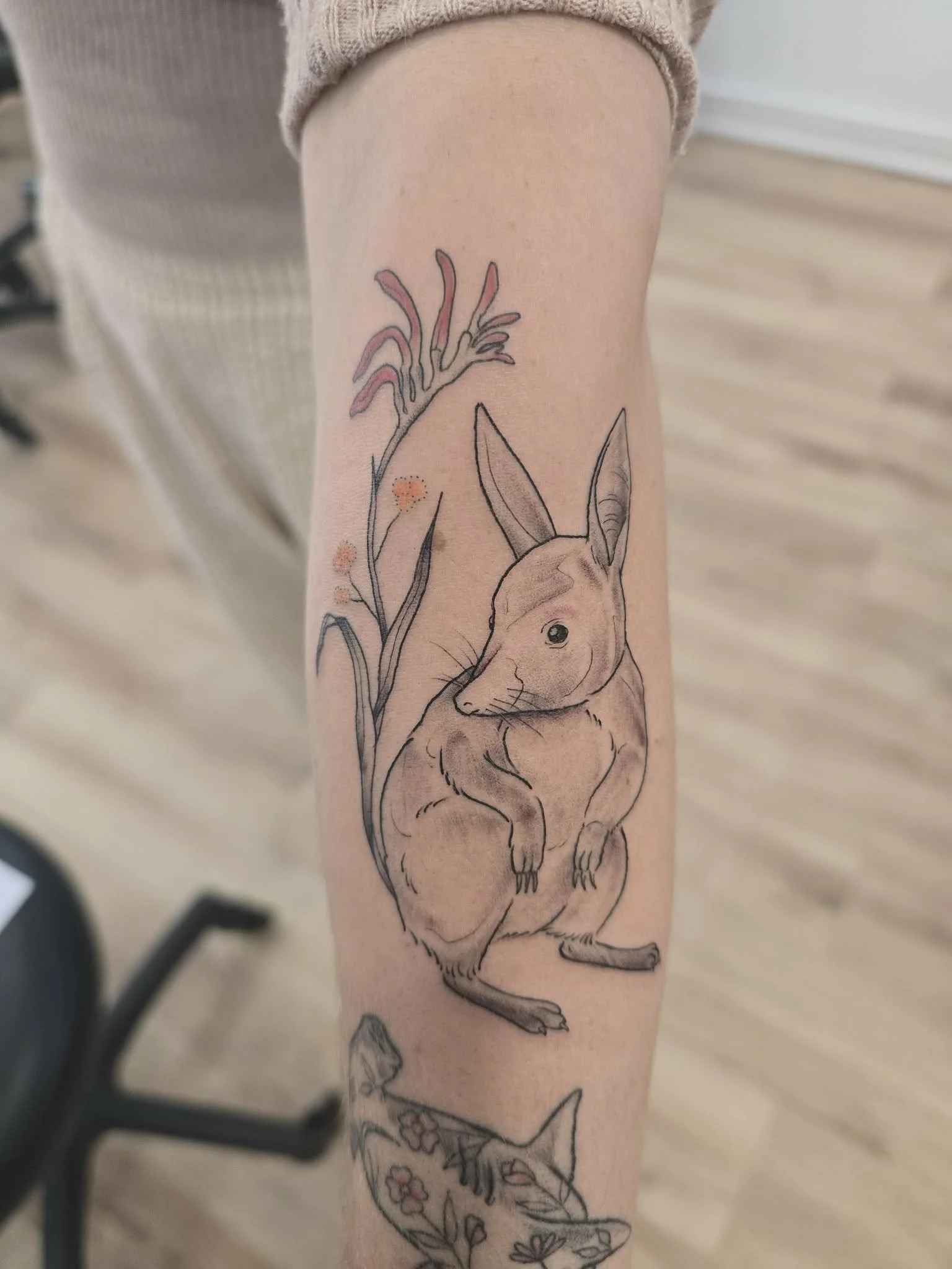Tattoo of a hare sitting among tall grass and flowers on a person's arm. fine-line-rose-tattoo-melbourne-moonee-ponds.jpg
minimalist-butterfly-tattoo-melbourne-studio.jpg
fine-line-realism-lion-tattoo-melbourne.jpg
american-traditional-panther-tattoo