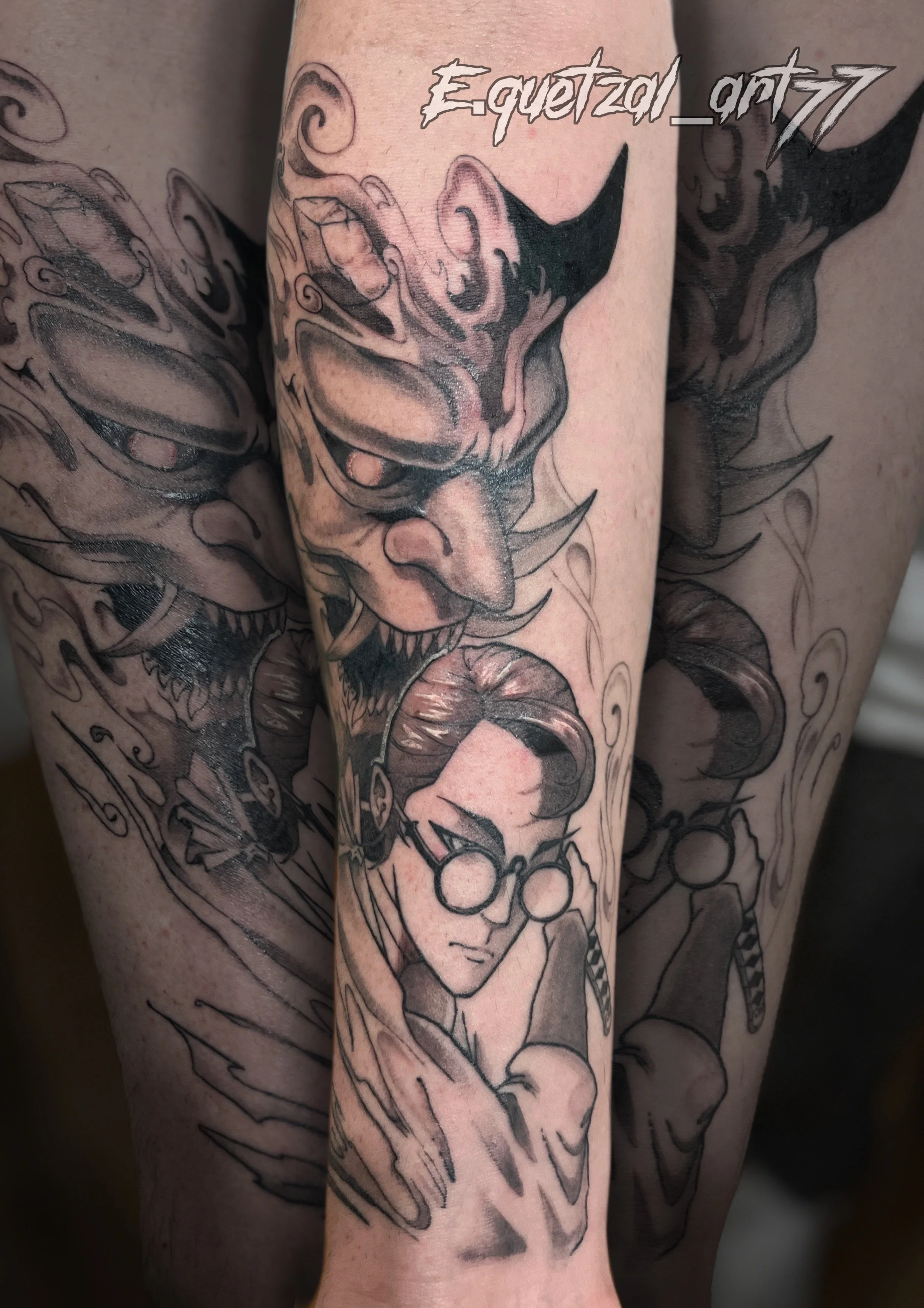 Black and gray tattoo of a fierce dragon's face and Harry Potter with glasses, both on a person's arm.