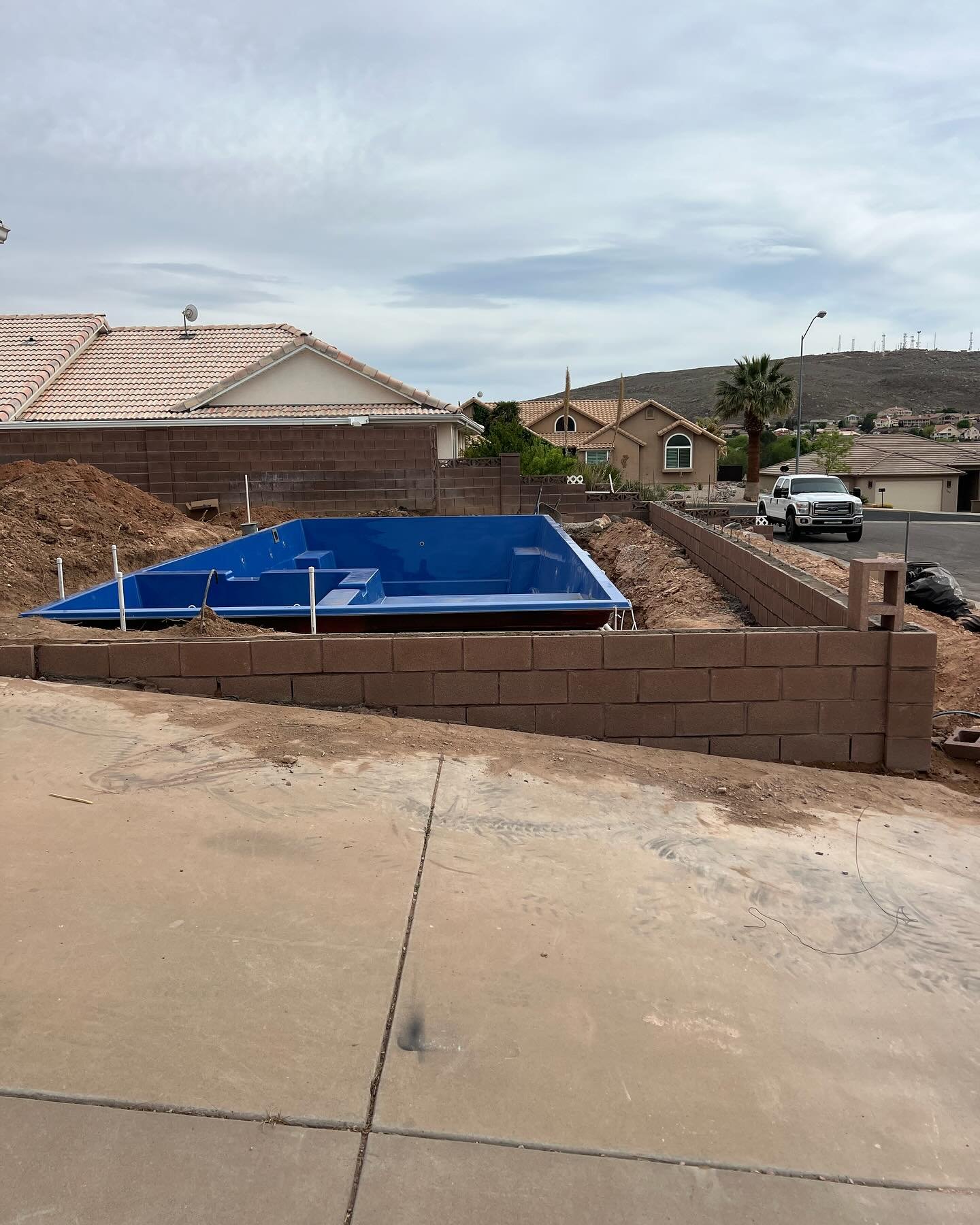 &ldquo;Exciting update! Our block retaining wall is officially finished, paving the way for pool backfilling. 🏊&zwj;♂️ We&rsquo;ve meticulously followed county code standards, ensuring top-notch concrete work and rebar reinforcement. Check out our p