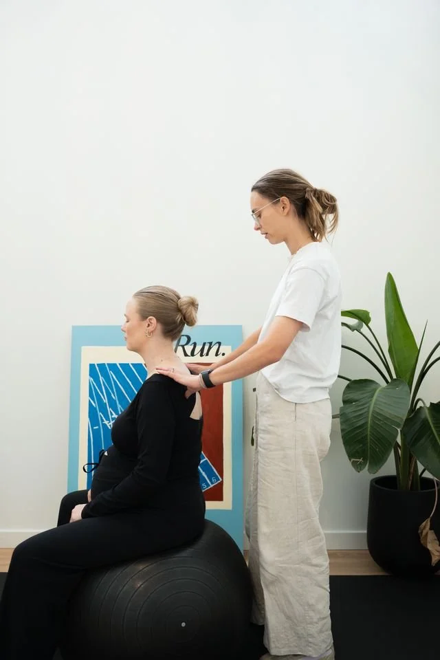 Physiotherapist treating pregnant women at Base Movements Physiotherapy Adelaide CBD