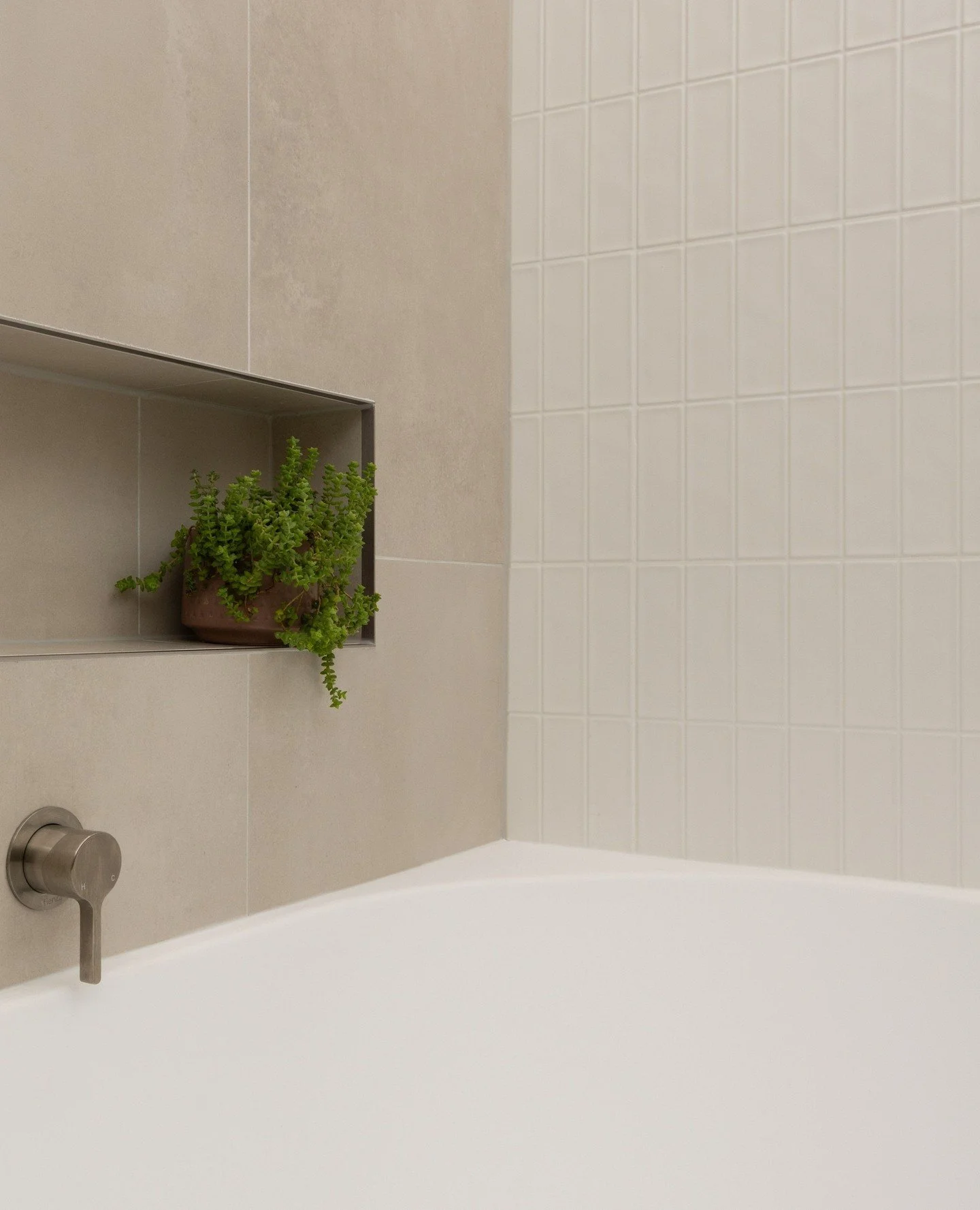 The beauty is in the details at our Greensborough project: warm terrazzo, gentle curves, subtle textures, and thoughtful practicality coming together perfectly.⁠
⁠
⁠
[ bathroom remodel, family bathroom, terrazzo bathroom, corner bath, small bathroom 
